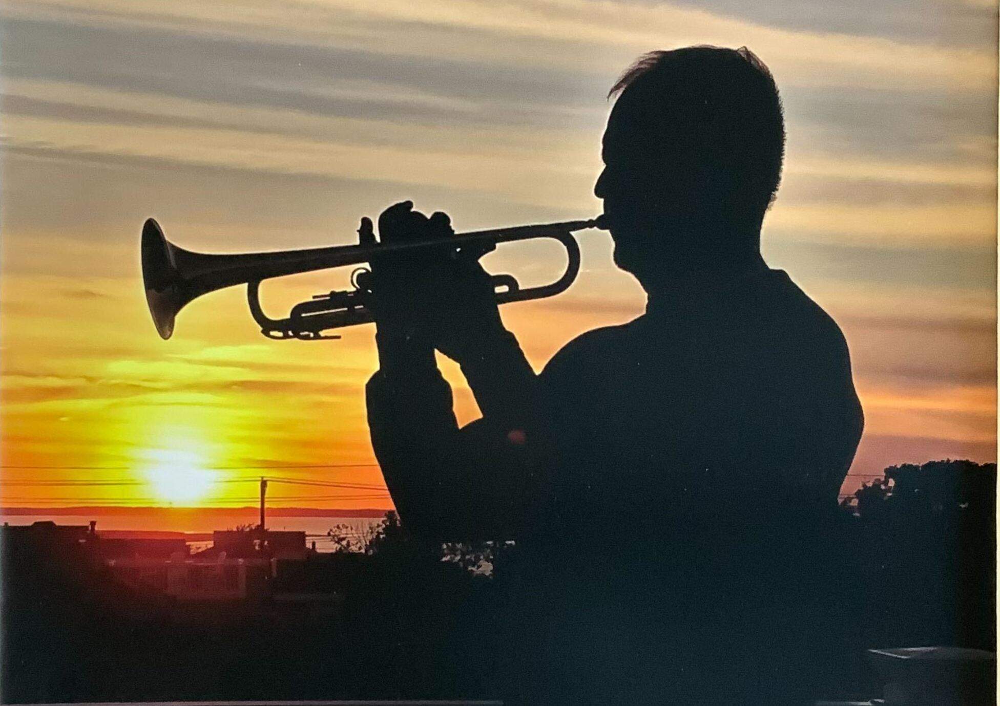 John Hersh plays "Taps" every night. (Courtesy of Don Havas)