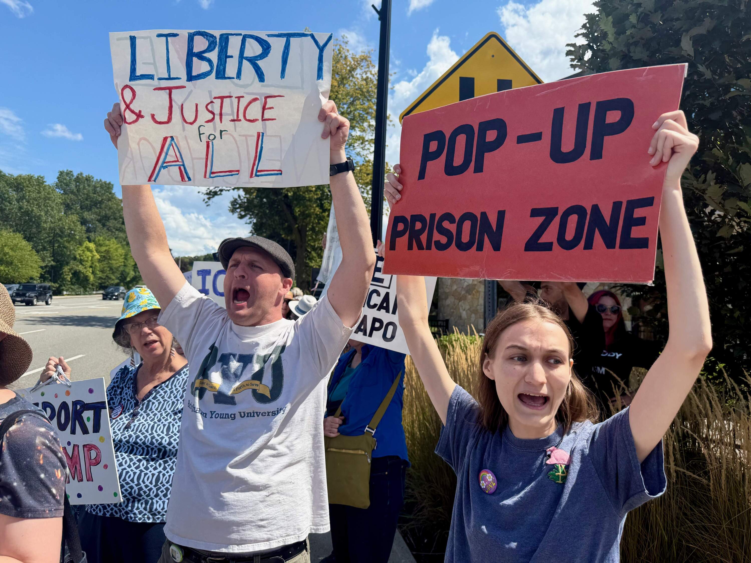 Hundreds gather every Wednesday outside of ICE's field office in Burlington to protest the agency and its alleged treatment of detainees. (Miriam Wasser/WBUR)