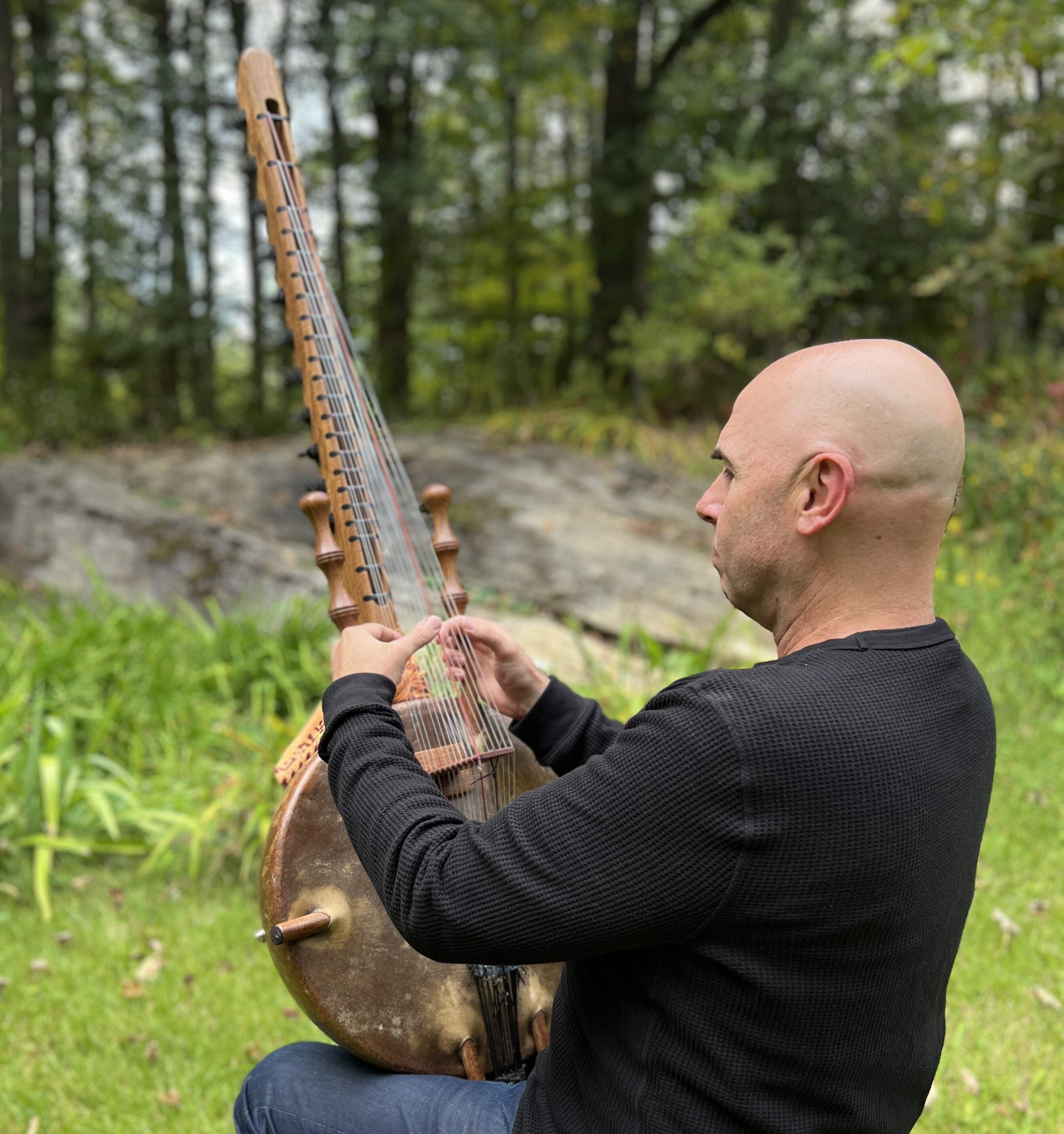 Eric Shimelonis plays the West African stringed instrument known as the kora. (image courtesy Rebecca Sheir)