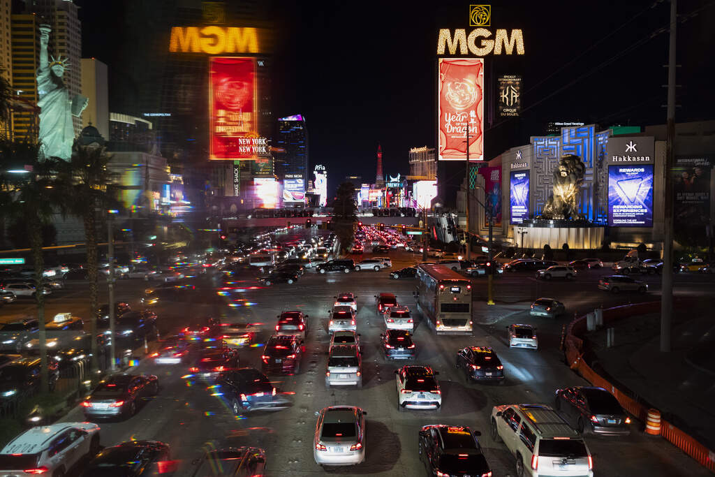 Cars travel through the Las Vegas Strip ahead of the 2024 Super Bowl in this file photo. (Andy Bao/AP)