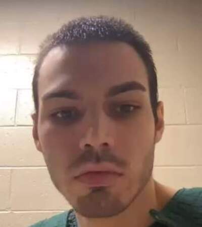 The suspect appeared through a video link from the Hillsborough County Department of Corrections, where he is being detained. (Todd Bookman/NHPR)