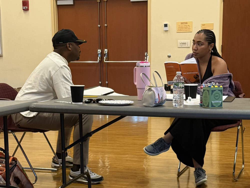 From left, Dominic Carter and Kiera Prusmack in rehearsals for "The Mountaintop." (Courtesy Front Porch Arts Collective)