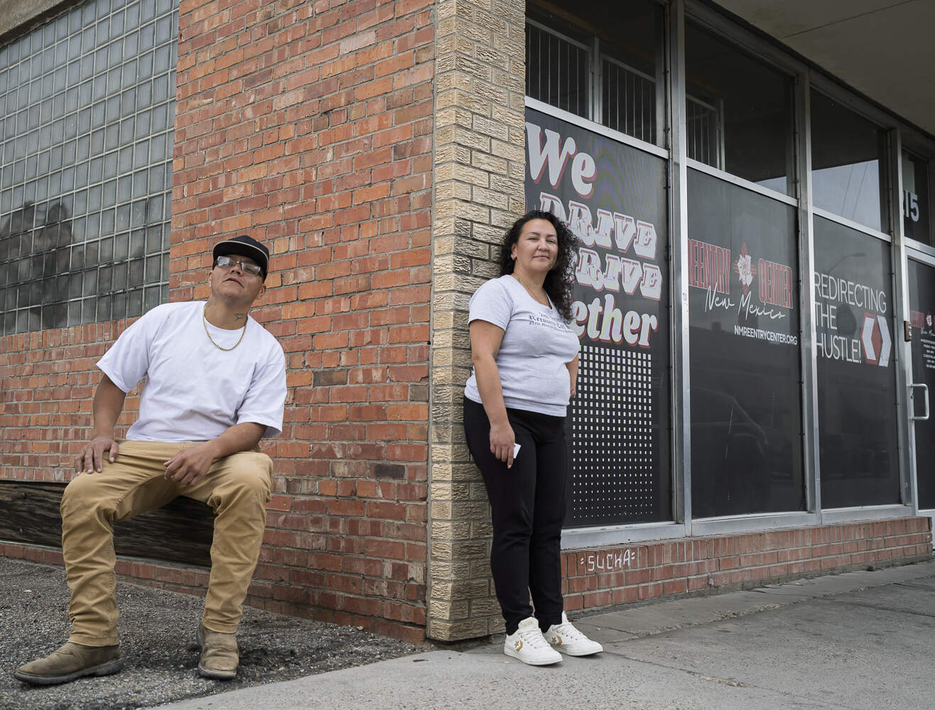 Manuel Lara, left, a client who has successfully overcome addiction after being released from jail with the help of Natasha Garcia, founder and executive director of the New Mexico Reentry Center in Albuquerque. (Roberto E. Rosales for Here &amp; Now)