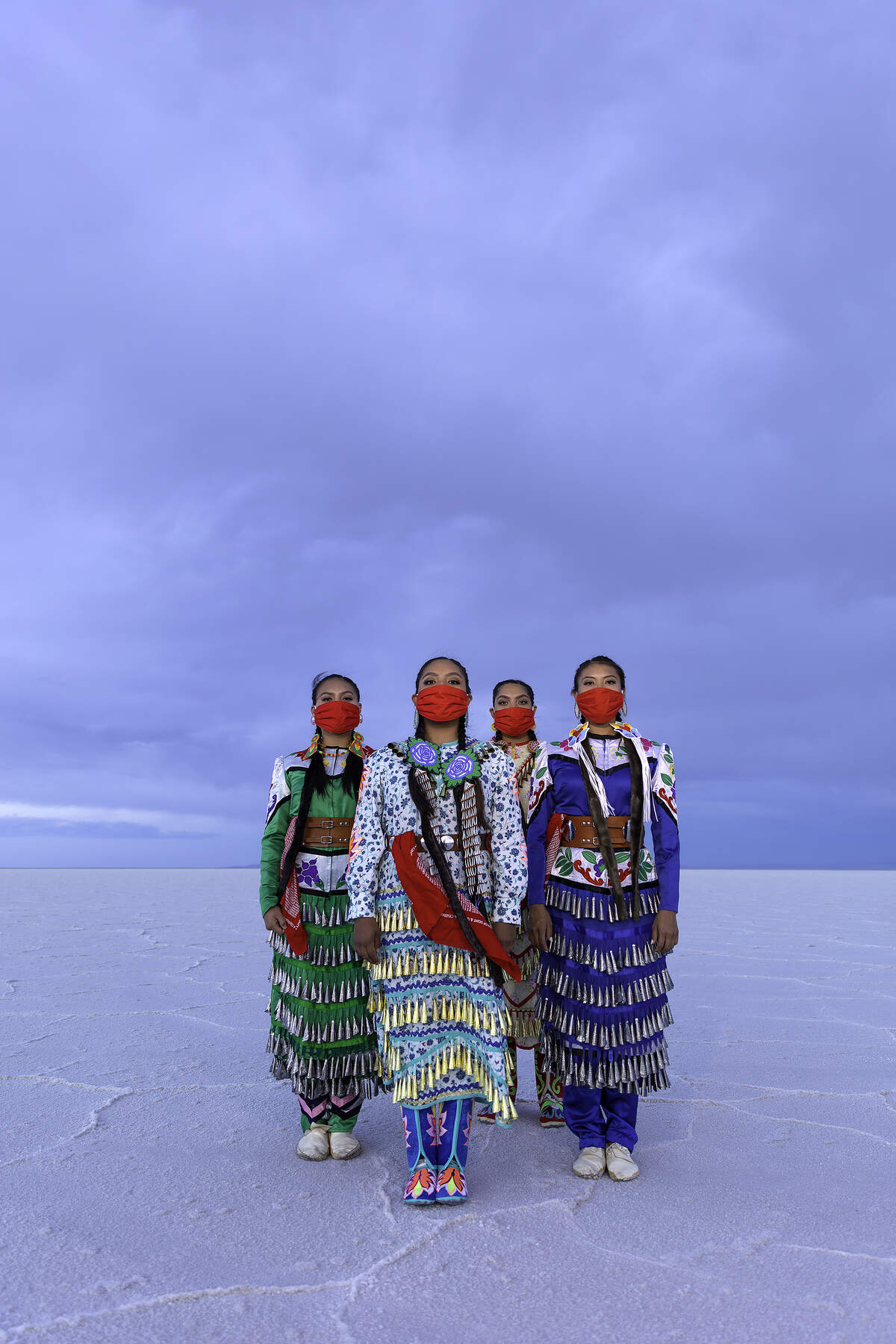 This is a limited-edition image from the Art Heals: The Jingle Dress Project photo series. This image was captured at the Salt Flats in Utah, native land of the Goshute people. (Courtesy of Eugene Tapahe)