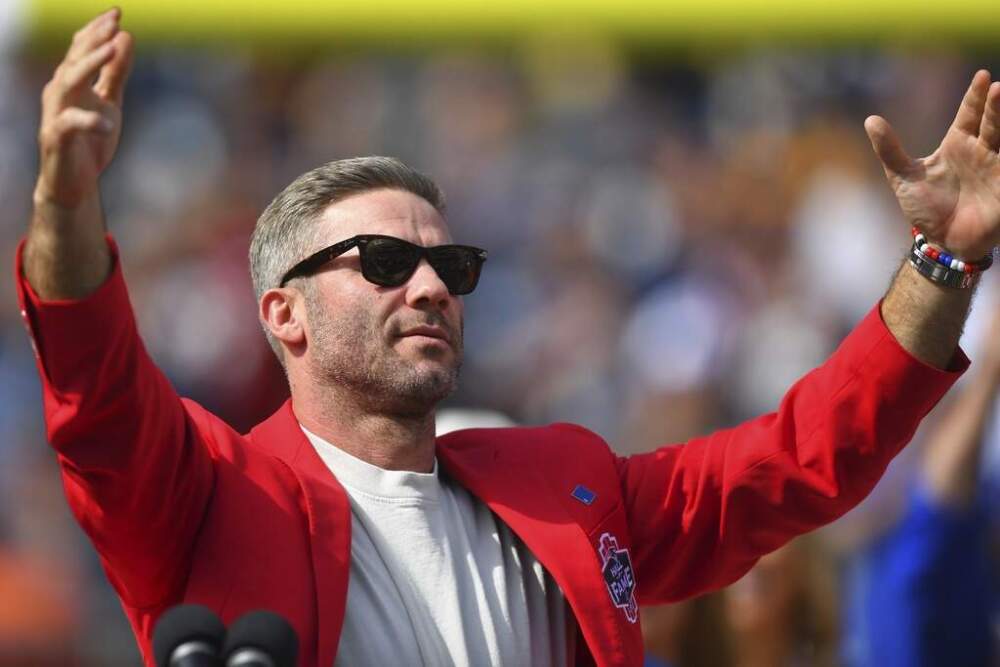 Julian Edelman greets the crowd during Patriots Hall of Fame ceremonies for Edelman during halftime at a game against the Pittsburgh Steelers. (Steven Senne/AP)