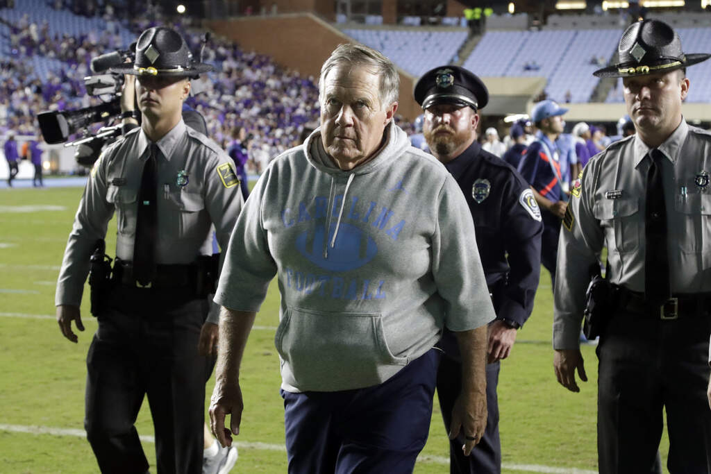 North Carolina head coach Bill Belichick, front, walks off the field after his team lost to TCU in an NCAA college football game Monday, Sept. 1, 2025, in Chapel Hill, N.C. (Chris Seward/AP)