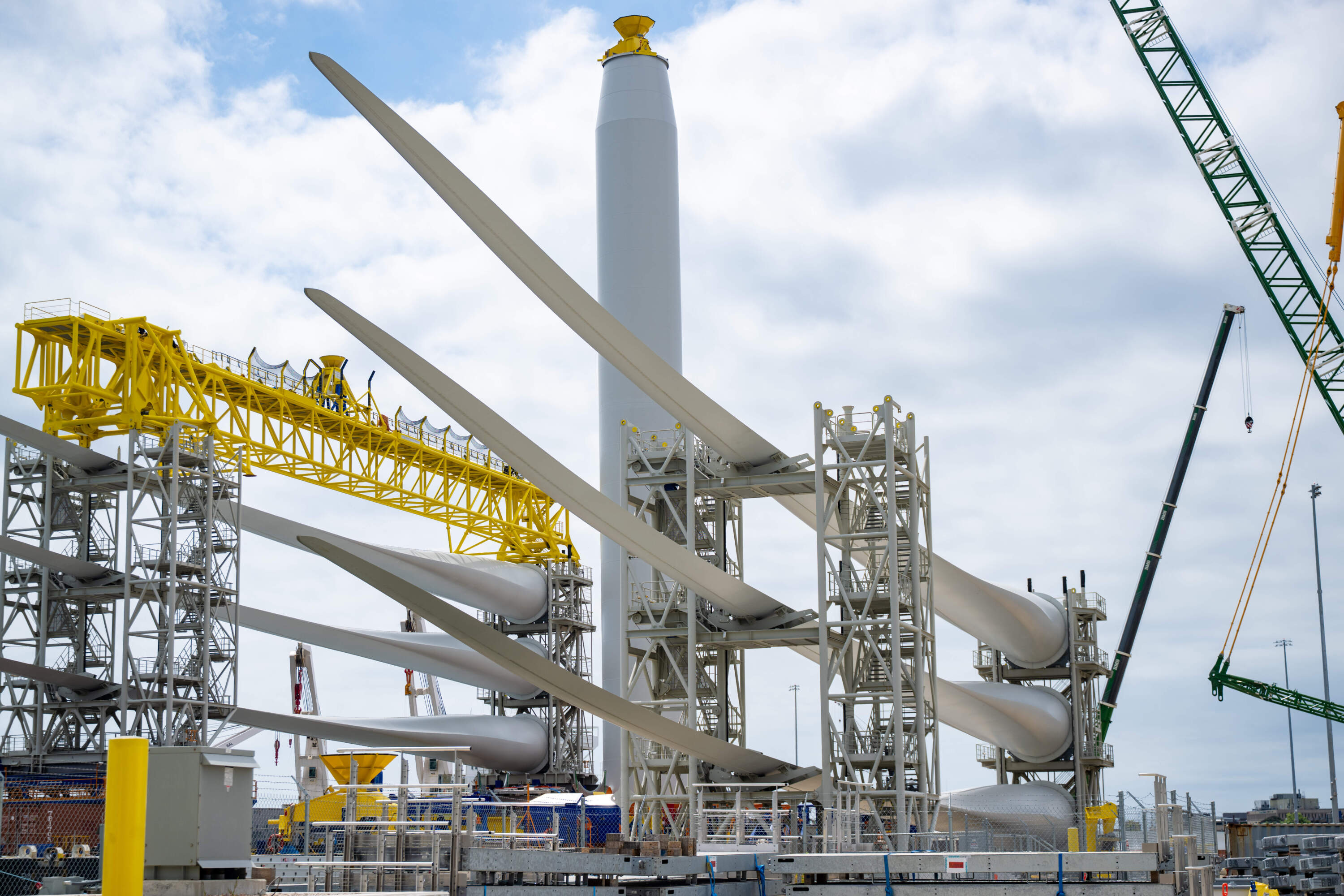 Blades and towers for the Revolution Wind project are staged in New London.(Tyler Russell/Connecticut Public)