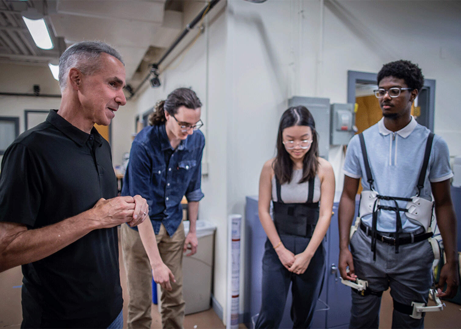 Dan Riccio, left, speaks with engineering students. (Courtesy of UMass)
