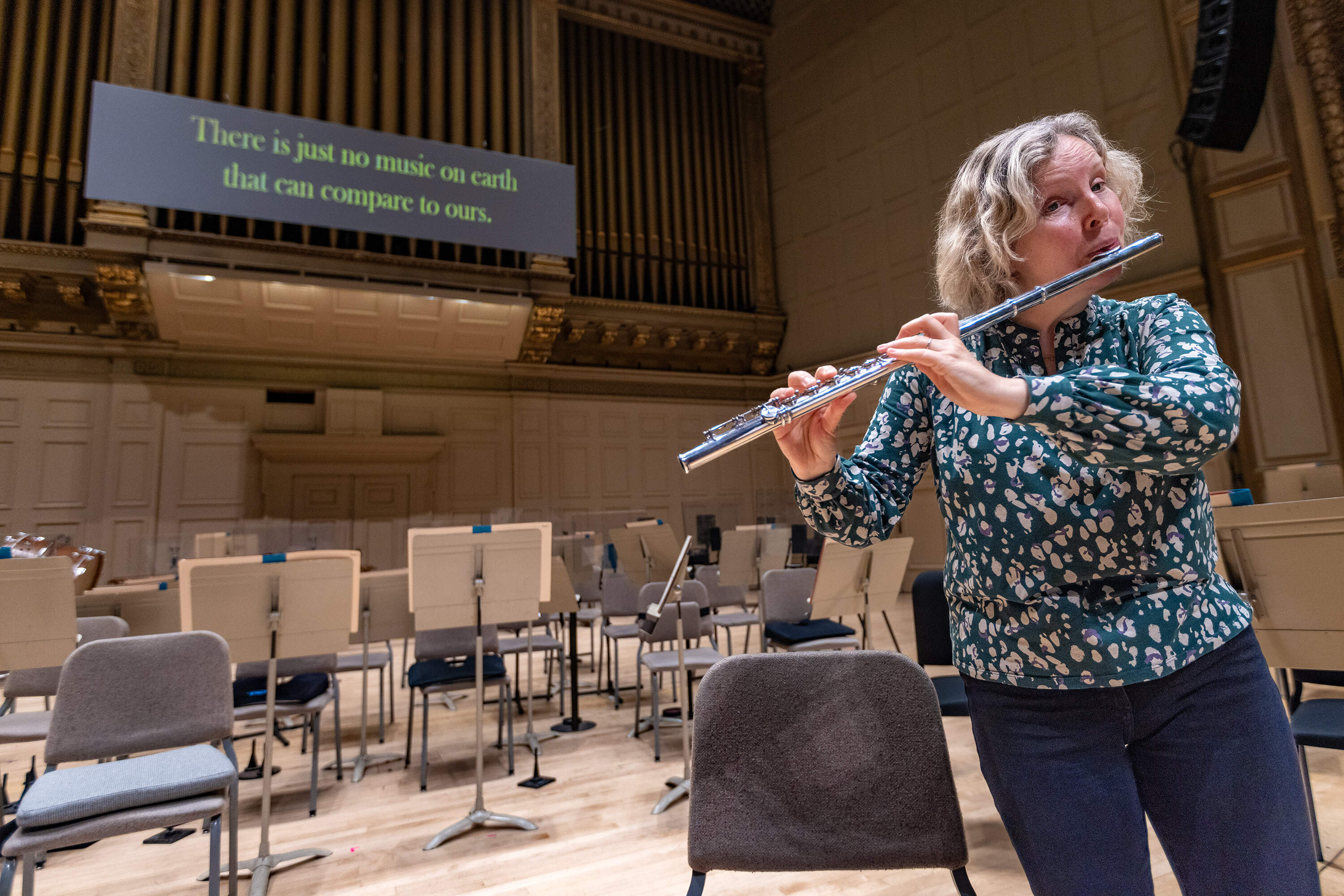 BSO PRINCIPal Flutital Flitist Loora McGhee Plays On Stage Durring A RheARSAL AT OMPONY HALLS. (Esse costa / wbur)