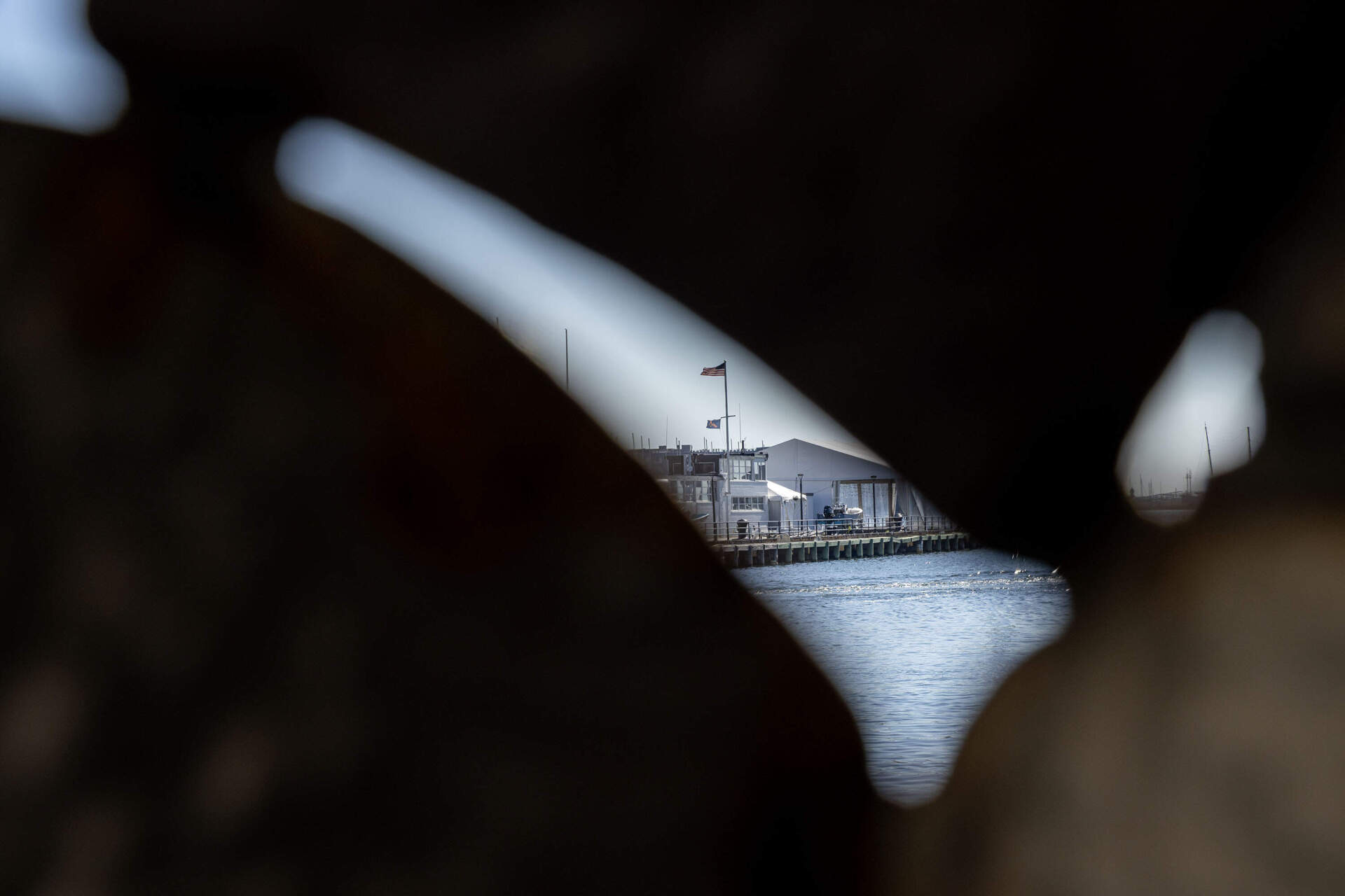 A view of Boston harbor from inside Beatriz Cortez's "Nomad 2," a steel vessel shaped like a whale vertebra. (Robin Lubbock/WBUR)