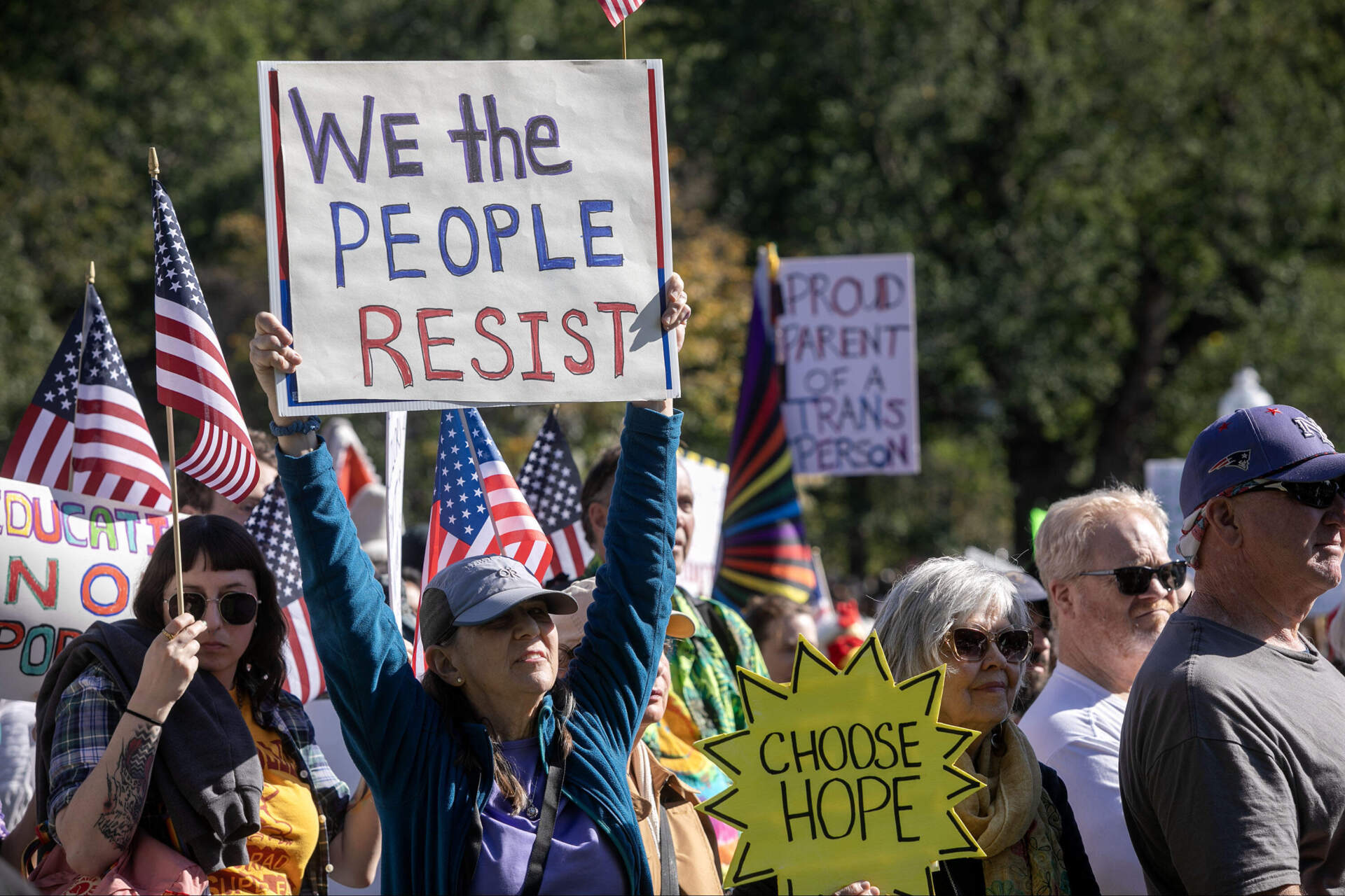 Signs at the rally on Boston Common. (Robin Lubbock/WBUR)