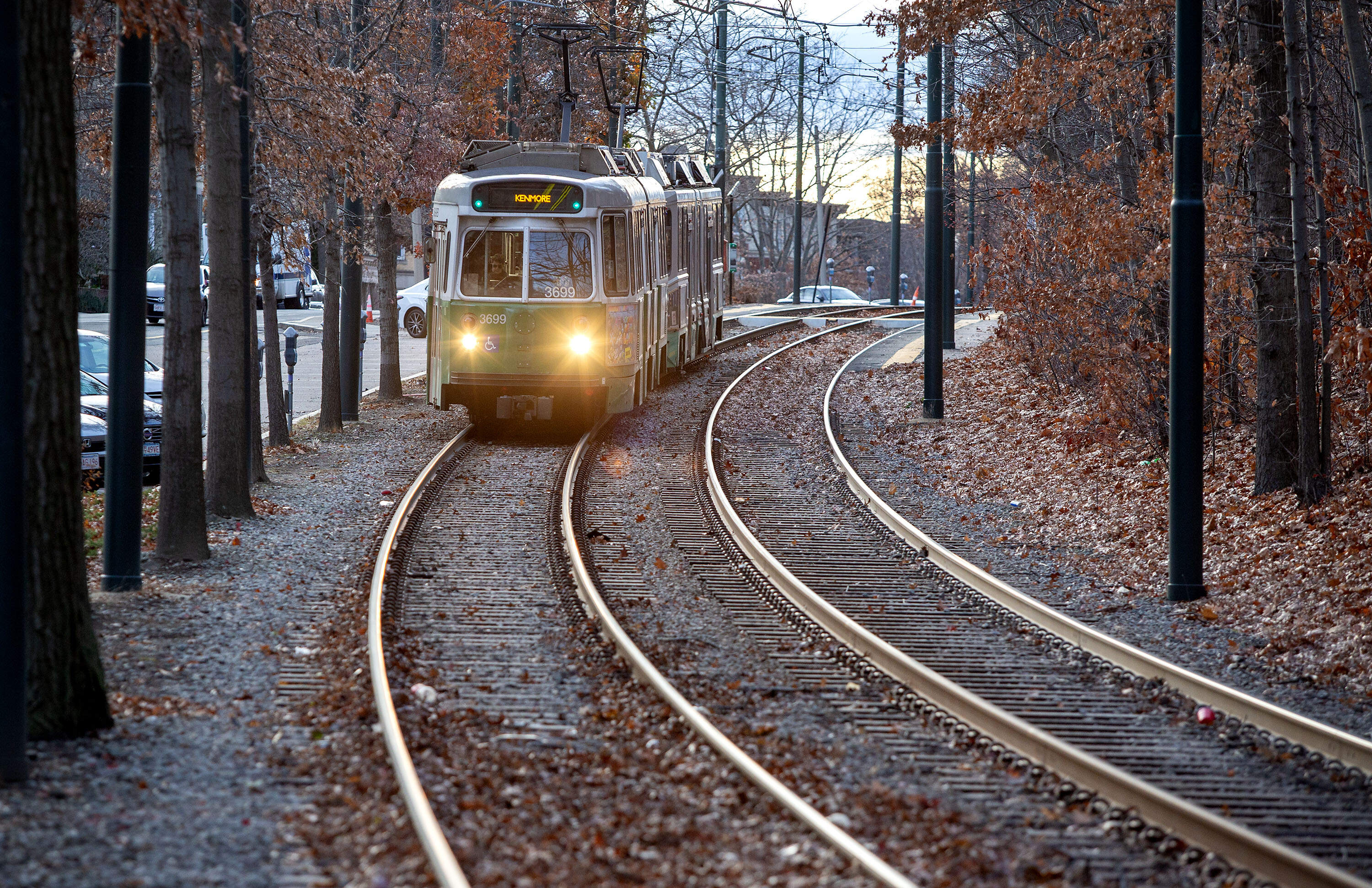 A train approaches Brandon Hall station on the MBTA's Green Line.