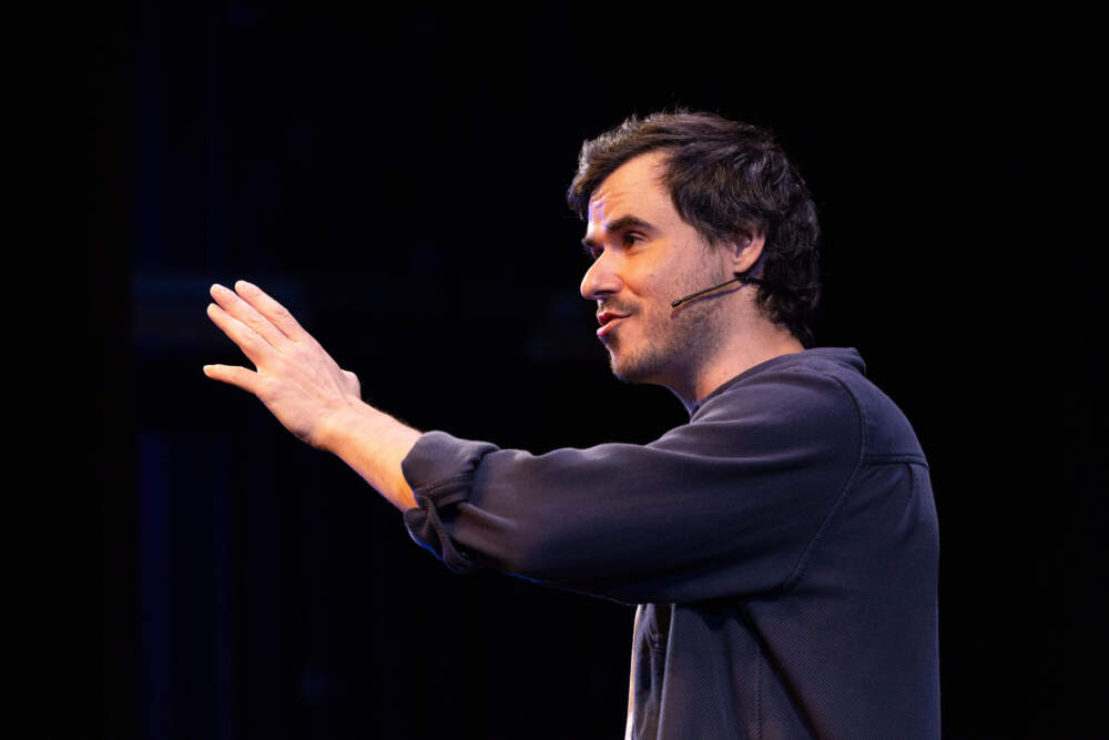 Sam Kissajukian onstage during a performance of "300 Paintings" at A.R.T. (Courtesy Evgenia Eliseeva)