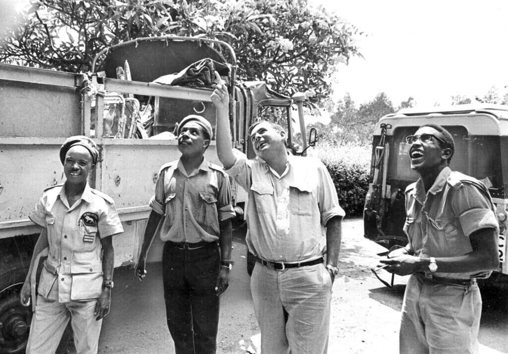 Patrick Hemingway with unidentified students and a game department official at the Wildlife Management College on the slopes of Mount Kilimanjaro, Tanzania in 1969. (Nair/AP)