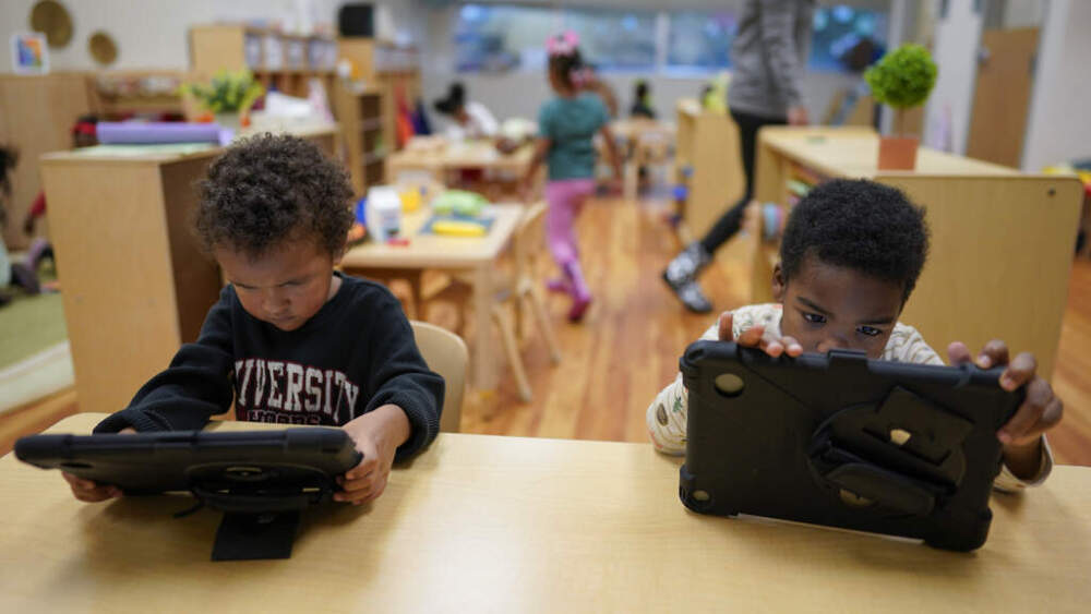 Children work on tablets at a Head Start program in Cincinnati on November21, 2023. (Carolyn Kaster/AP)