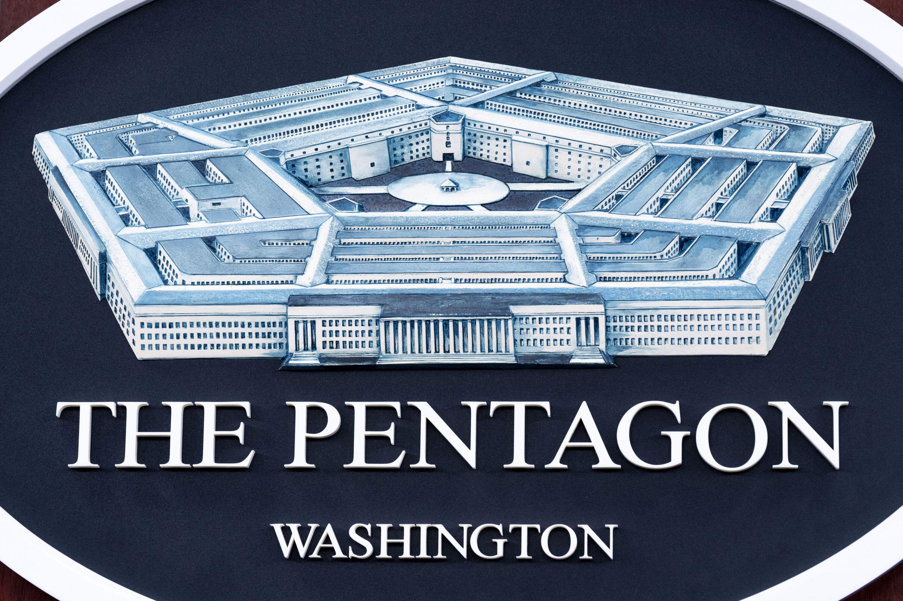 The Department of Defense logo is seen on the wall in the Press Briefing room at the Pentagon on Tuesday, Oct. 29, 2024 in Washington. (Kevin Wolf/AP)