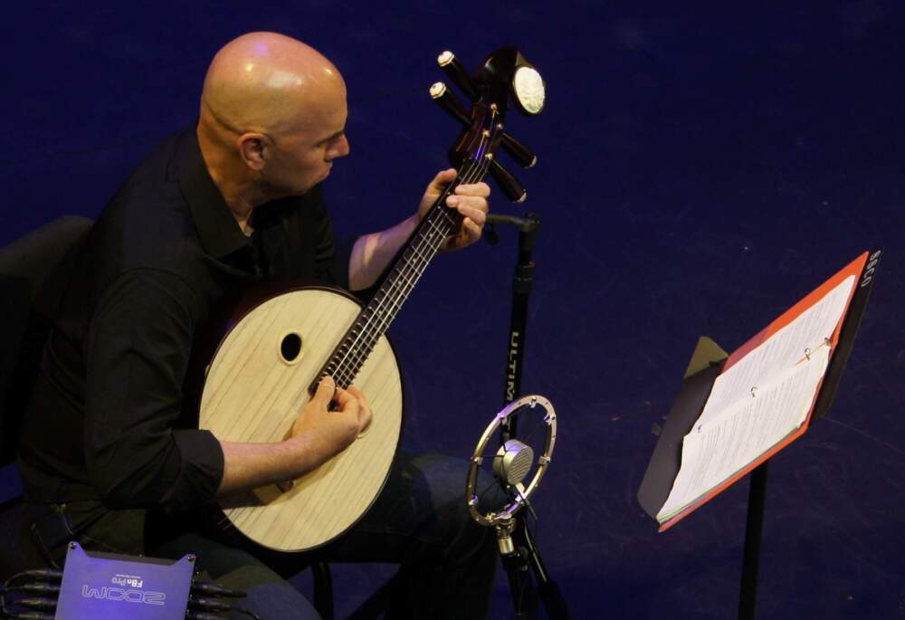 At the PACE Center in Parker, CO, Eric Shimelonis plays the ruan: a Chinese lute with four strings and 24 frets. (Image courtesy of Hannah Rose Emert)
