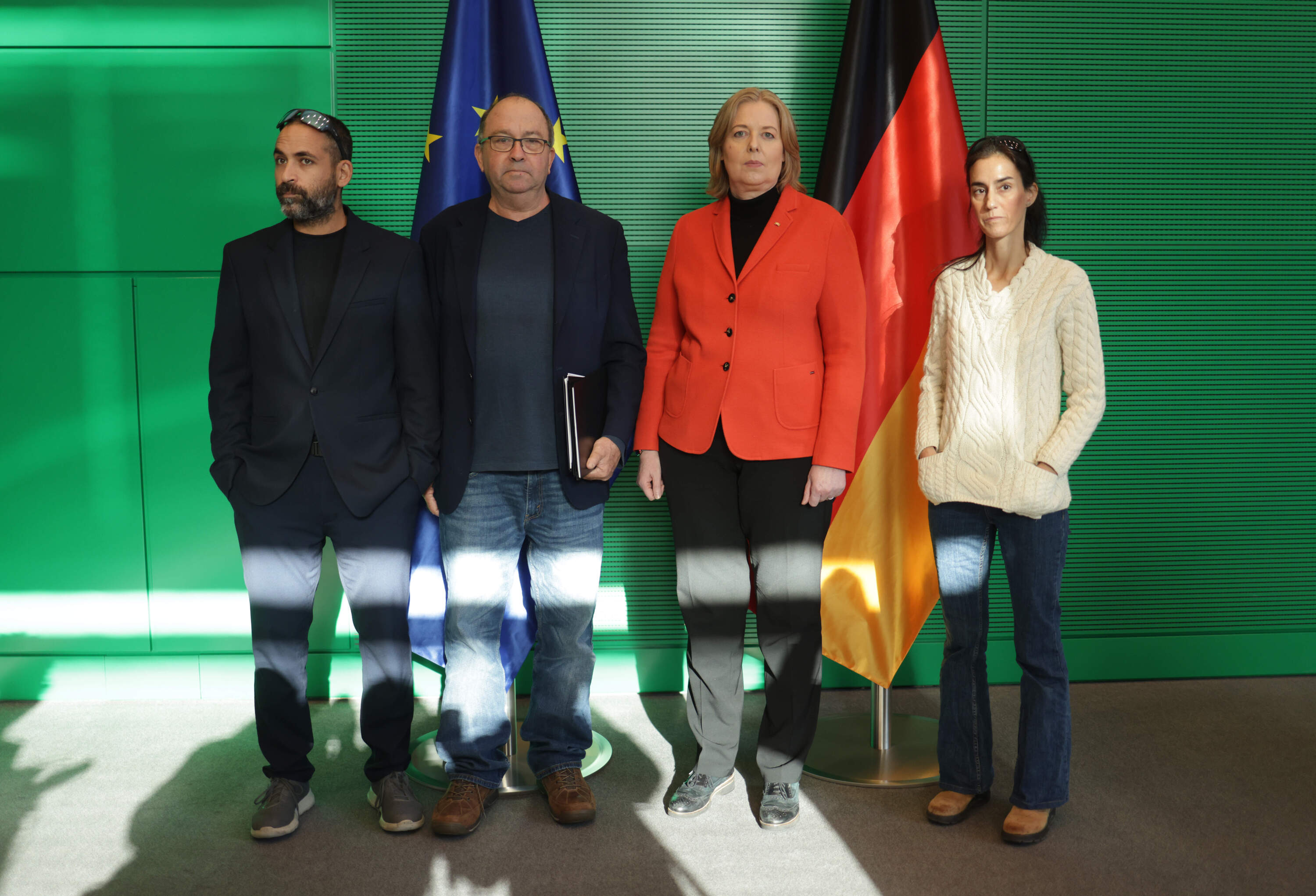 Family members of Israeli hostages in Gaza, including Batsheva Cohen (R), Avihai Brodutch (L) and Gilad Kormgold, arrive for talks with Bundestag President Baerbel Bas (in orange jacket) on Nov. 16, 2023 in Berlin, Germany. The three are in Berlin to seek German assistance in attaining the release of the hostages. (Sean Gallup/Getty Images)