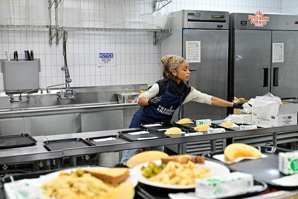 A volunteer works at Feeding America's Hunger Action Day at Harlem Community Kitchen in New York City on September 9. (Eugene Gologursky/Getty Images for Feeding America)