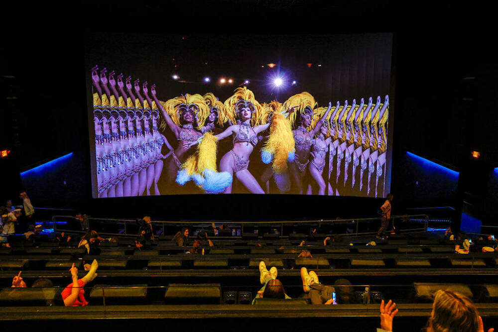 Audience members watch a film screening during Fans Celebrate The Theatrical Release Of "Taylor Swift: The Official Release Party Of A Showgirl" at Westfield Century City on October 03, 2025 in Los Angeles, California. (Frazer Harrison/Getty Images)