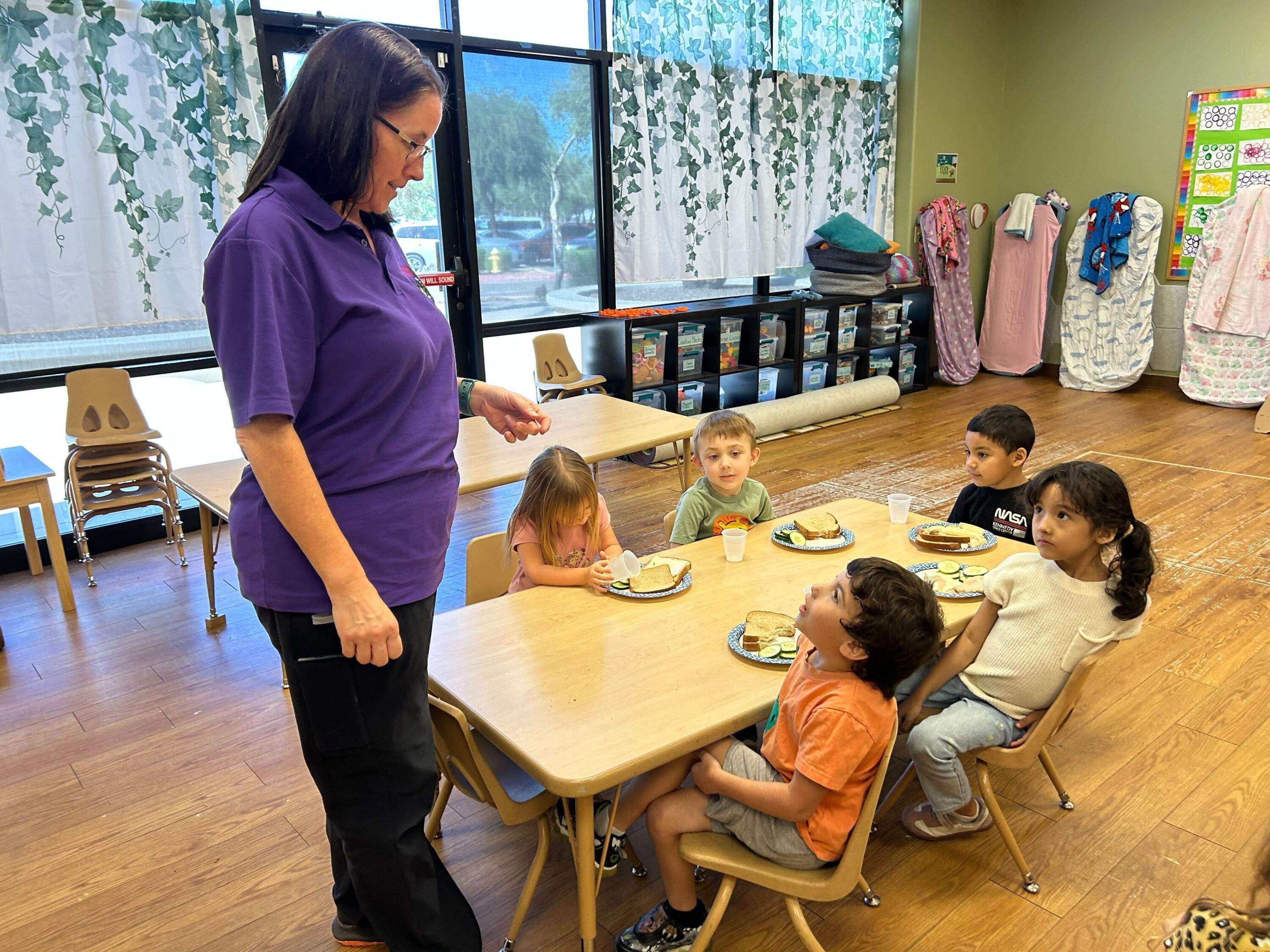 Ms. Lisa teaches at the Children's Safari Learning Center in Mesa, Arizona. (Peter O'Dowd/Here &amp; Now)