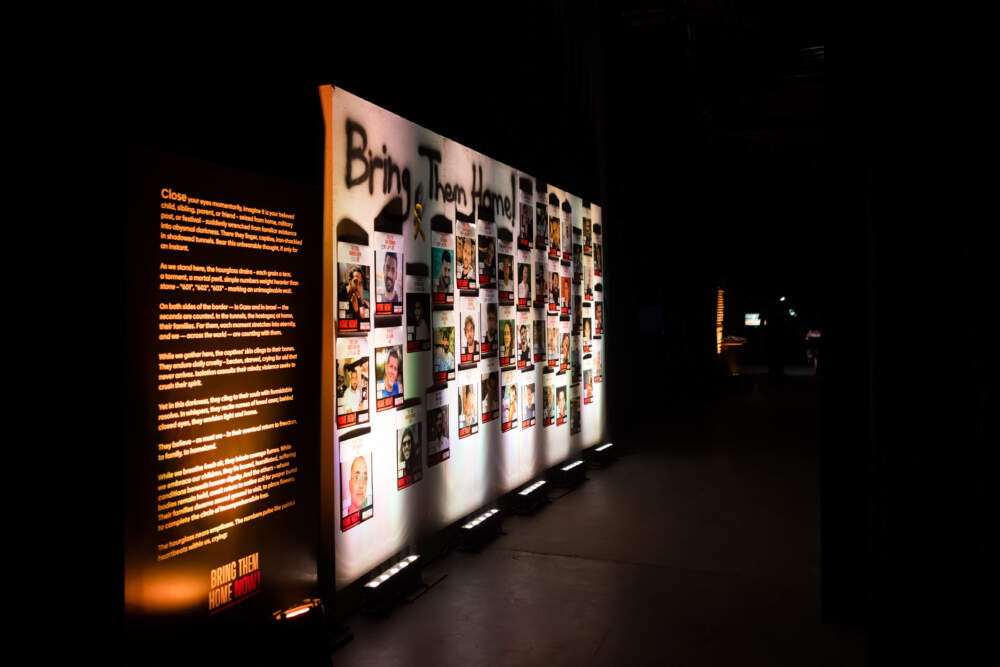A wall at the Nova Music Festival Exhibition in Boston features the images of hostages taken by Hamas terrorists on Oct. 7 2023. (Courtesy of Nova Music Festival Exhibition)