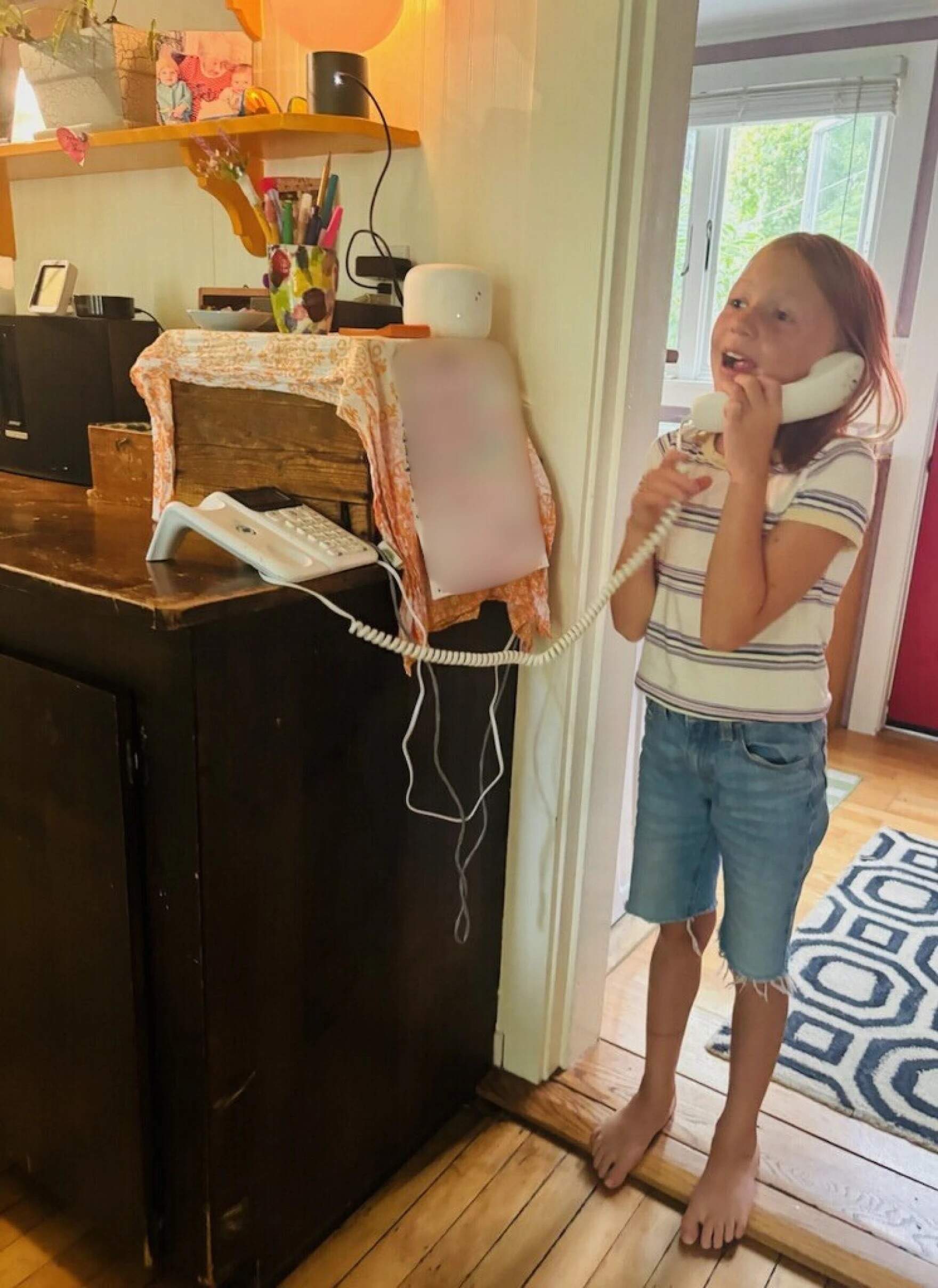 Piper Morse talks on the phone. (Courtesy Caron Morse)