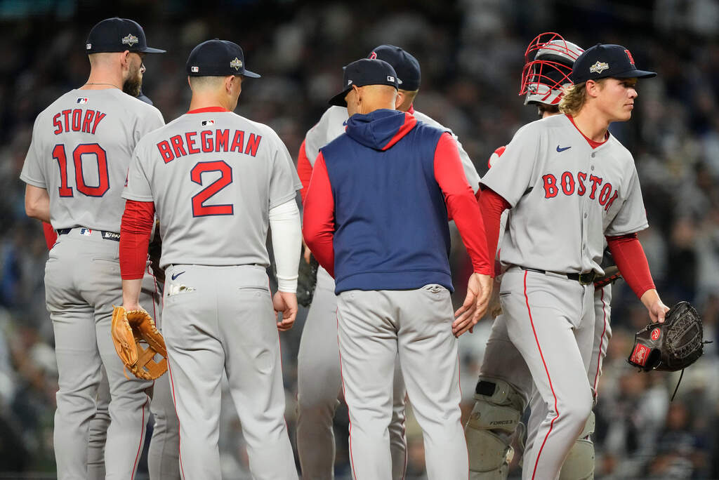 Boston Red Sox pitcher Connelly Early, right, leaves the game during the fourth inning of Game 3, Thursday, Oct. 2, 2025. (Yuki Iwamura/AP)