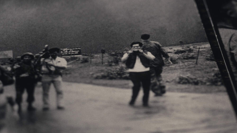 Nguyen Thanh Nghe, seen photographing the aftermath of the napalm attack in Trang Bang, Vietnam, June 1972 (Bettman Archive/Getty/The Stringer)