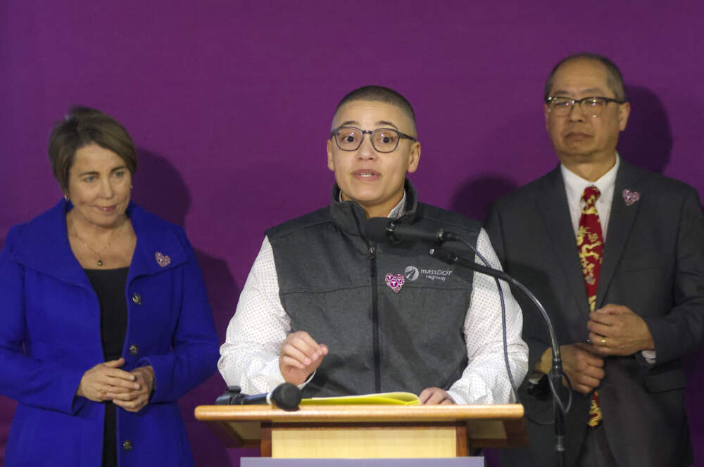 Transportation Secretary Monica Tibbits-Nutt speaks at a press conference at North Station in February 2024. In the background are Gov. Maura Healey and MBTA General Manager Phillip Eng. (Photo by Matthew J. Lee/The Boston Globe via Getty Images)