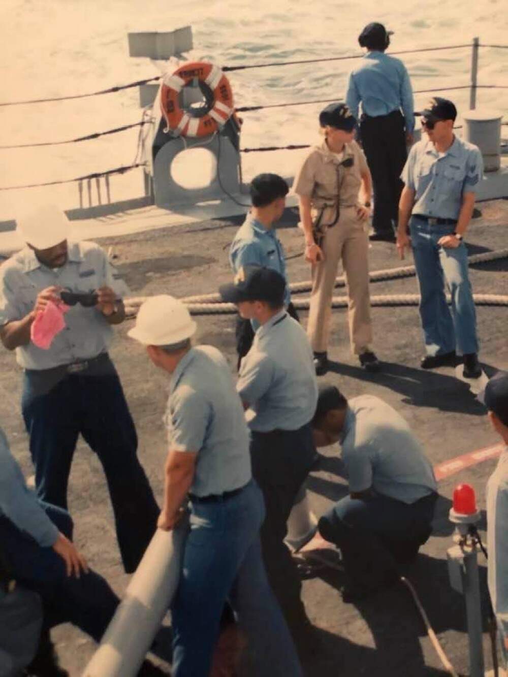 The author (in khaki) with men in her division on the USS Truett, circa 1993. (Courtesy Laura McTaggart)