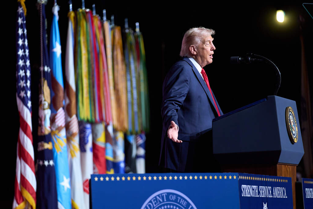 President Donald Trump speaks to a gathering of top U.S. military commanders at Marine Corps Base Quantico, Tuesday, Sept. 30, 2025, in Quantico, Va. (AP Photo/Evan Vucci)