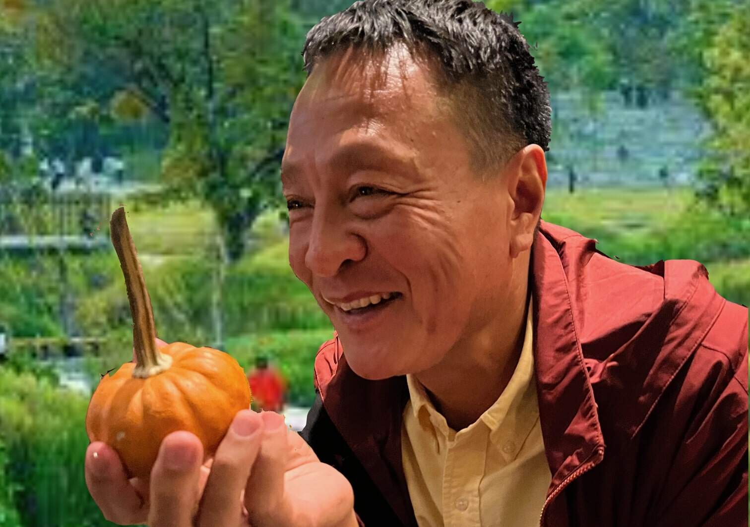Kongjian Yu holds an impromptu organic model of Earth, expounding on his 'sponge planet' ideas. (Courtesy of Stephen Ervin)