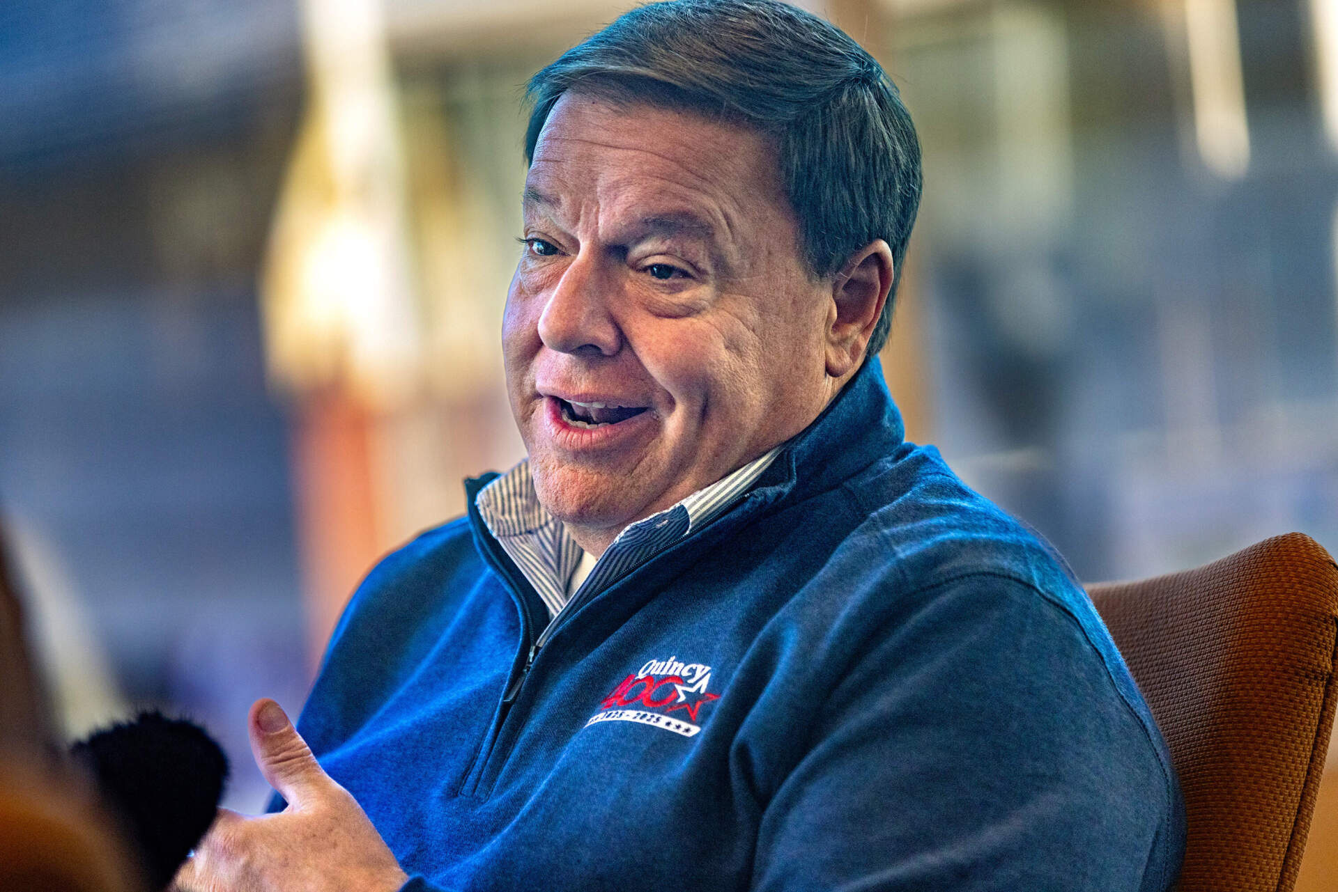 Quincy mayor Thomas Koch speaks with WBUR reporter Simón Rios in his office at City Hall. (Jesse Costa/WBUR)