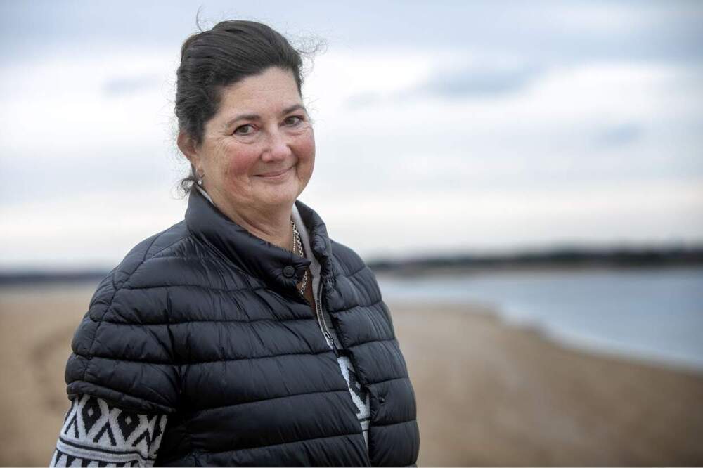 Lela Wright on the beach near her beachfront home on Reservation Terrace on Plum Island. (Robin Lubbock/WBUR)
