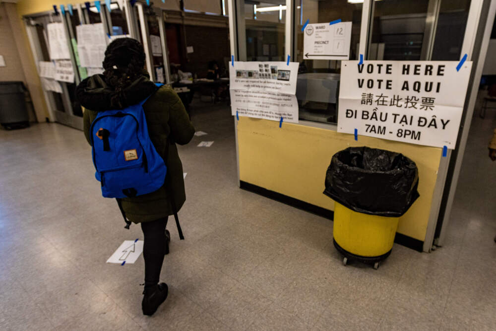 A voter walks into the Yawkey Boys and Girls Club in Roxbury Tuesday morning. (Jesse Costa/WBUR)