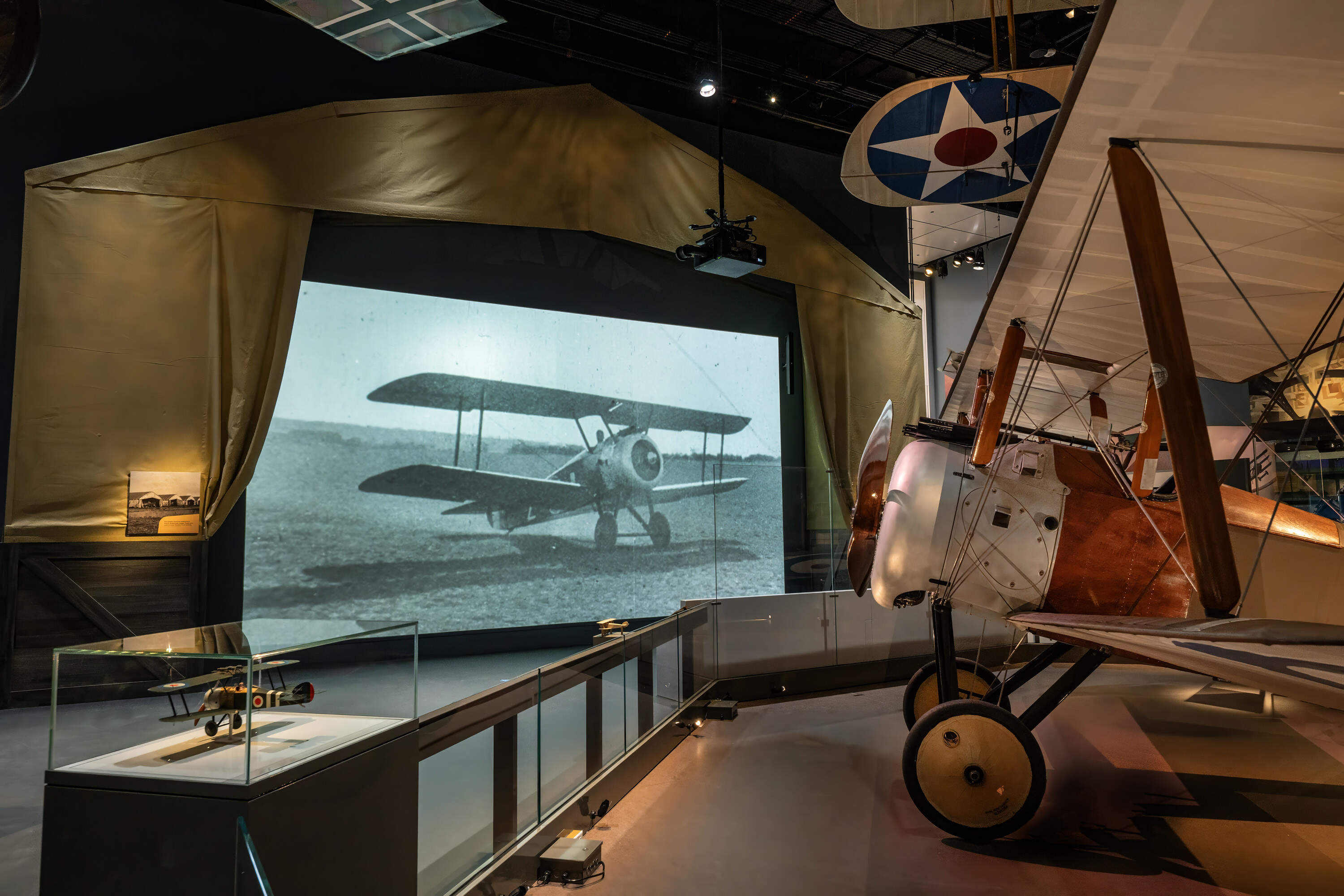 An immersive "in-flight" projection in front of the Sopwith F.1 Camel in the "World War I: The Birth of Military Aviation" exhibition at the Smithsonian's National Air and Space Museum. (Mark Avino/Smithsonian's National Air and Space Museum)