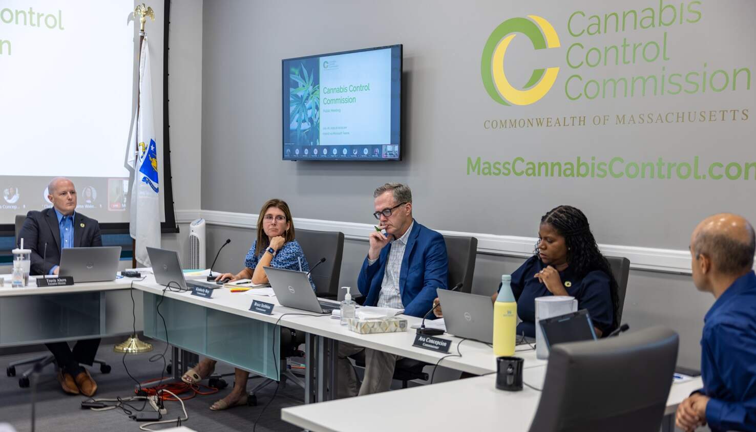 Ava Callender Concepcion, second from right, listens during a Cannabis Control Commission meeting on Monday, July 28. (Courtesy of the Cannabis Control Commission via SHNS)