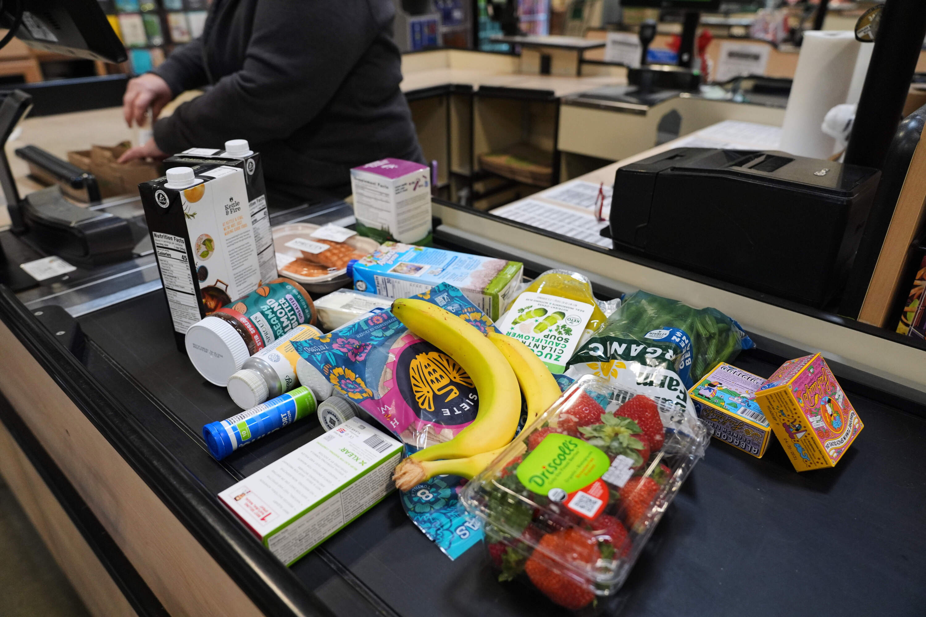 A cashier scans groceries, including produce, which is covered by the USDA Supplemental Nutrition Assistance Program (SNAP), at a grocery store in Baltimore, Monday, Nov. 10, 2025. (Stephanie Scarbrough/AP)