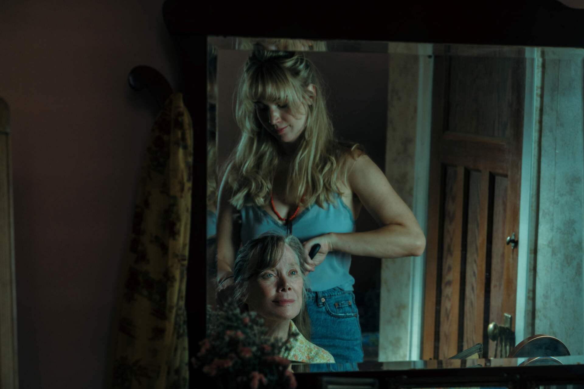 Jennifer Lawrence (standing) and Sissy Spacek in "Die My Love." (Courtesy Kimberly French/MUBI)