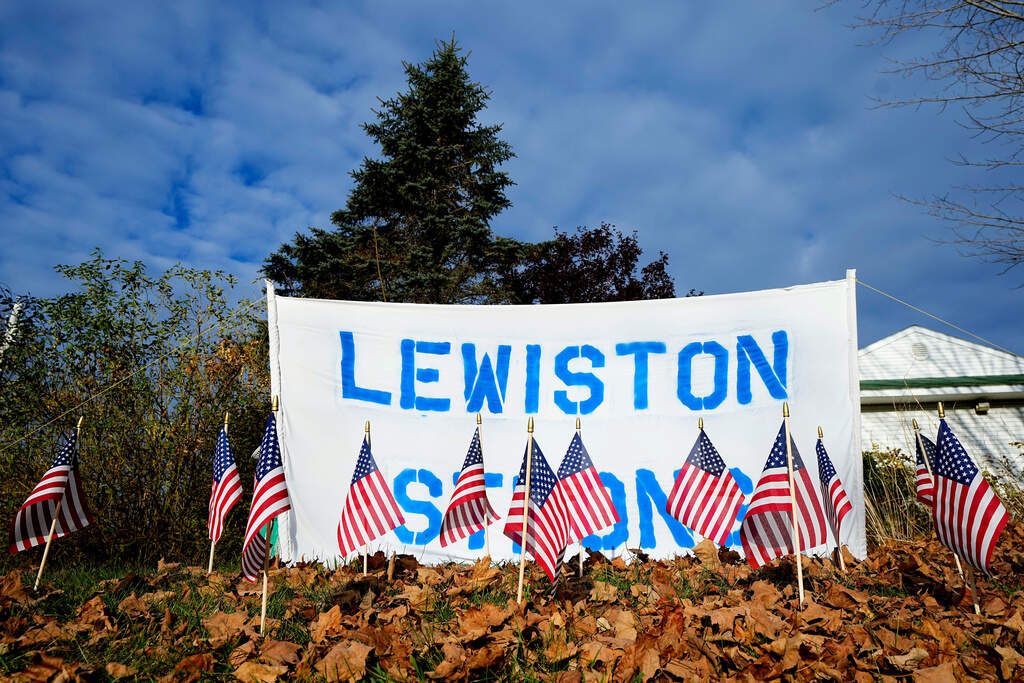 A make-shift memorial lines Main Street following a deadly mass shooting in Maine, Nov. 3, 2023, in Lewiston, Maine. (Matt York/AP)