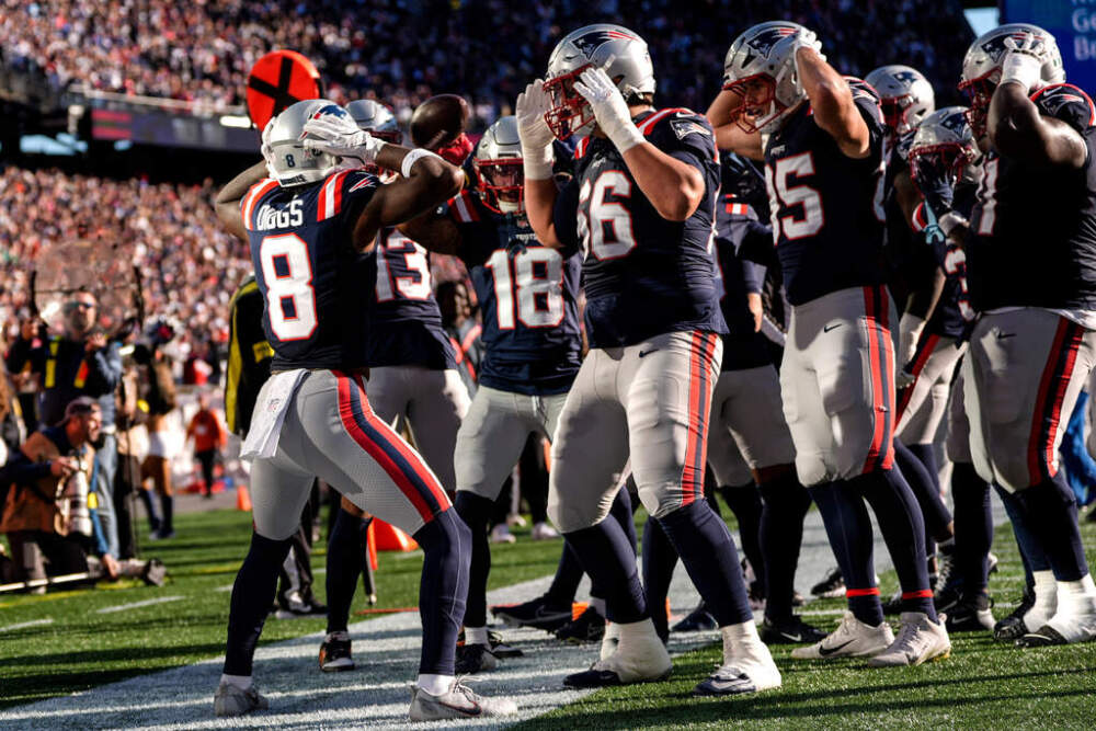 New England Patriots wide receiver Stefon Diggs, left, celebrates his touchdown against the Atlanta Falcons, Sunday, Nov. 2, 2025, in Foxborough, Mass. (Charles Krupa/AP)