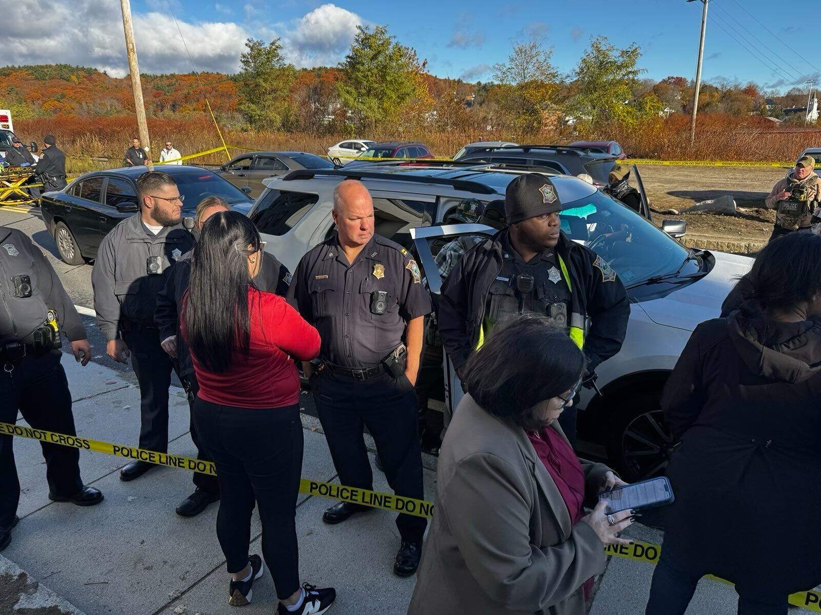 Fitchburg police stand between protestors and federal police during a November 6 ICE arrest in the city. (Courtesy: LUCE Immigrant Justice Network)