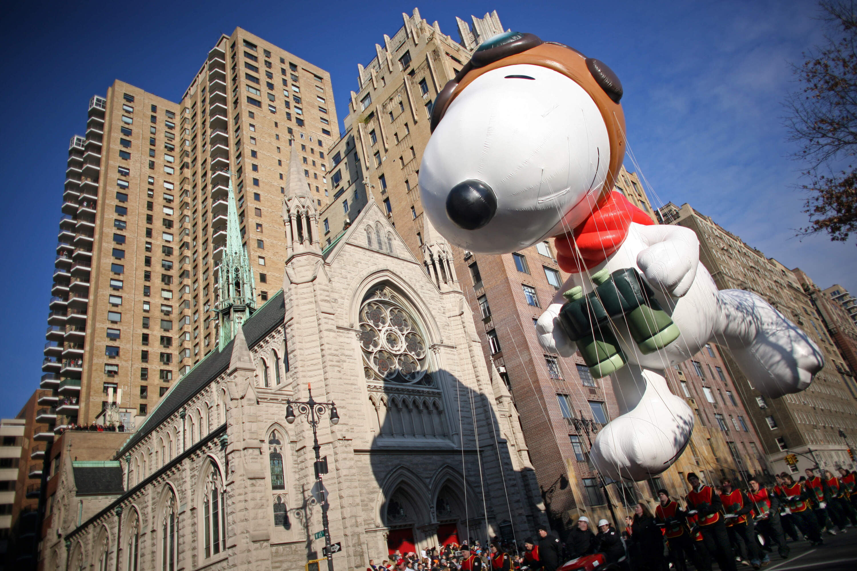 Parade participants guide a Snoopy float at the annual Macy's Thanksgiving Day Parade on Nov. 27, 2008 in New York City. (Yana Paskova/Getty Images)