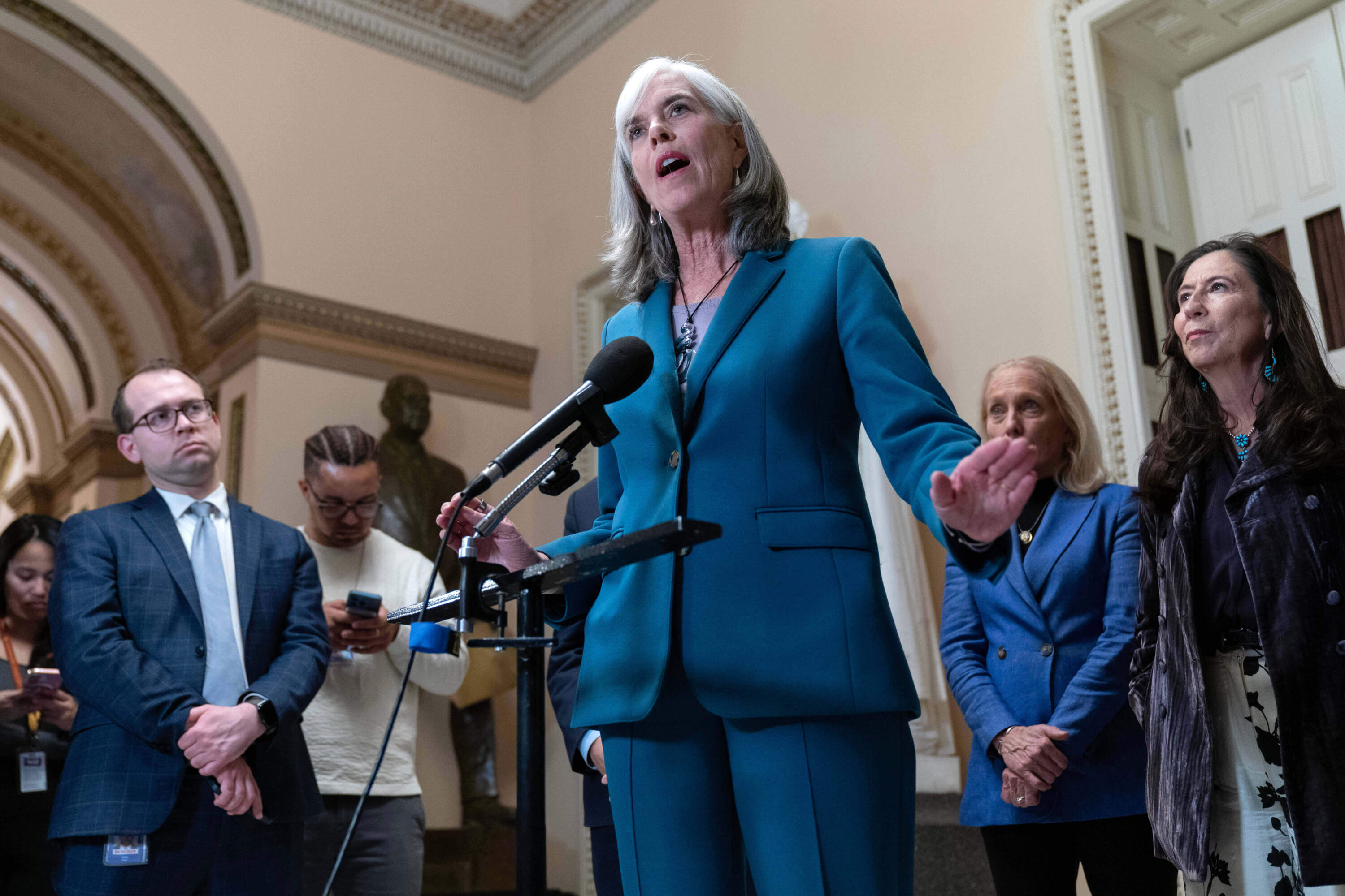 Democratic Whip Rep. Katherine Clark talks to reporters Tuesday, a day before the House prepares to vote on a bill to reopen the government. (Jose Luis Magana/AP)