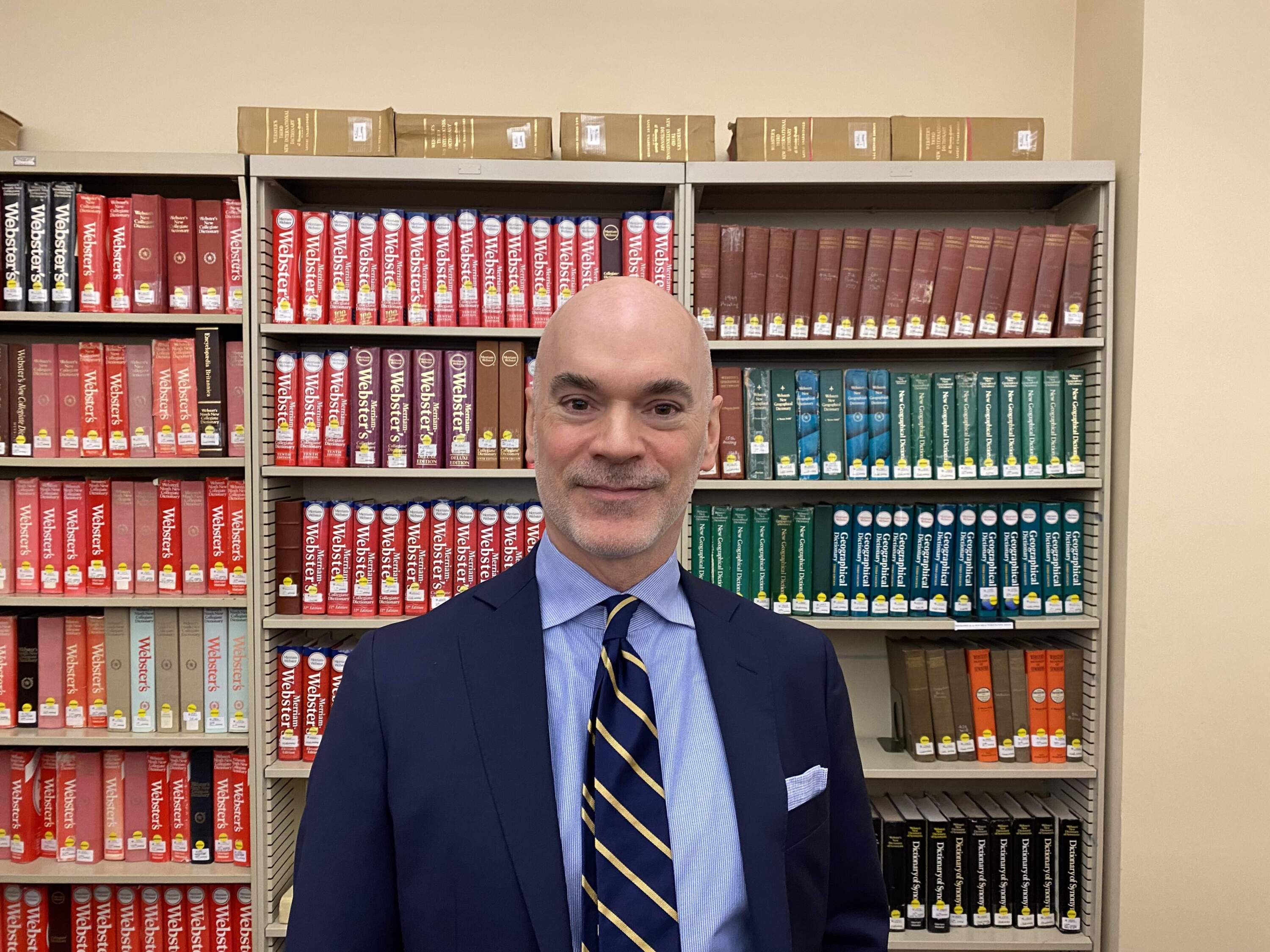 "The dictionary is still a neutral and objective arbiter of meaning," said Peter Sokolowski, editor-at-large at Merriam-Webster. "I think it always has been, but that means something else in an age of deep fakes and fake news." (Andrea Shea/WBUR)