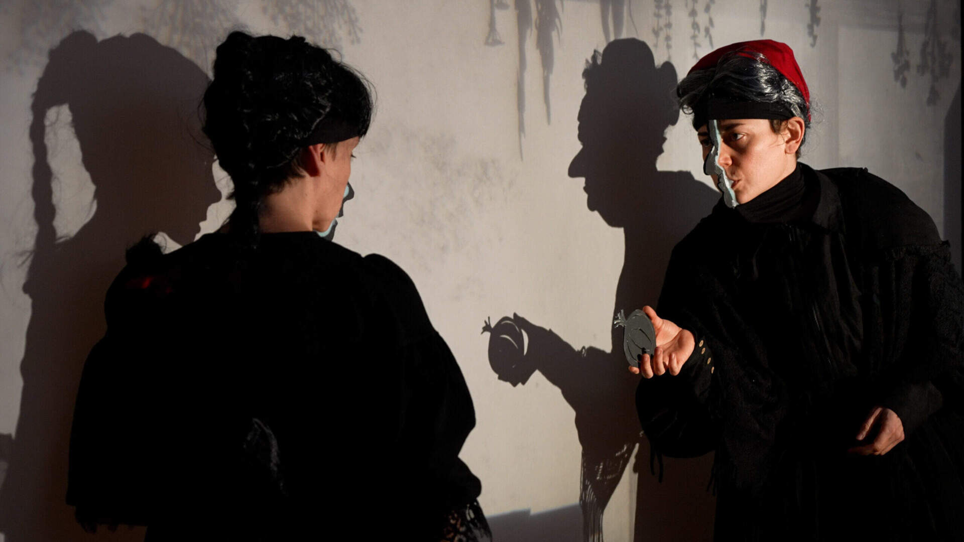 From left, Sarah Fornace and Julia Miller in Manual Cinema's "The 4th Witch." (Courtesy Katie Doyle)