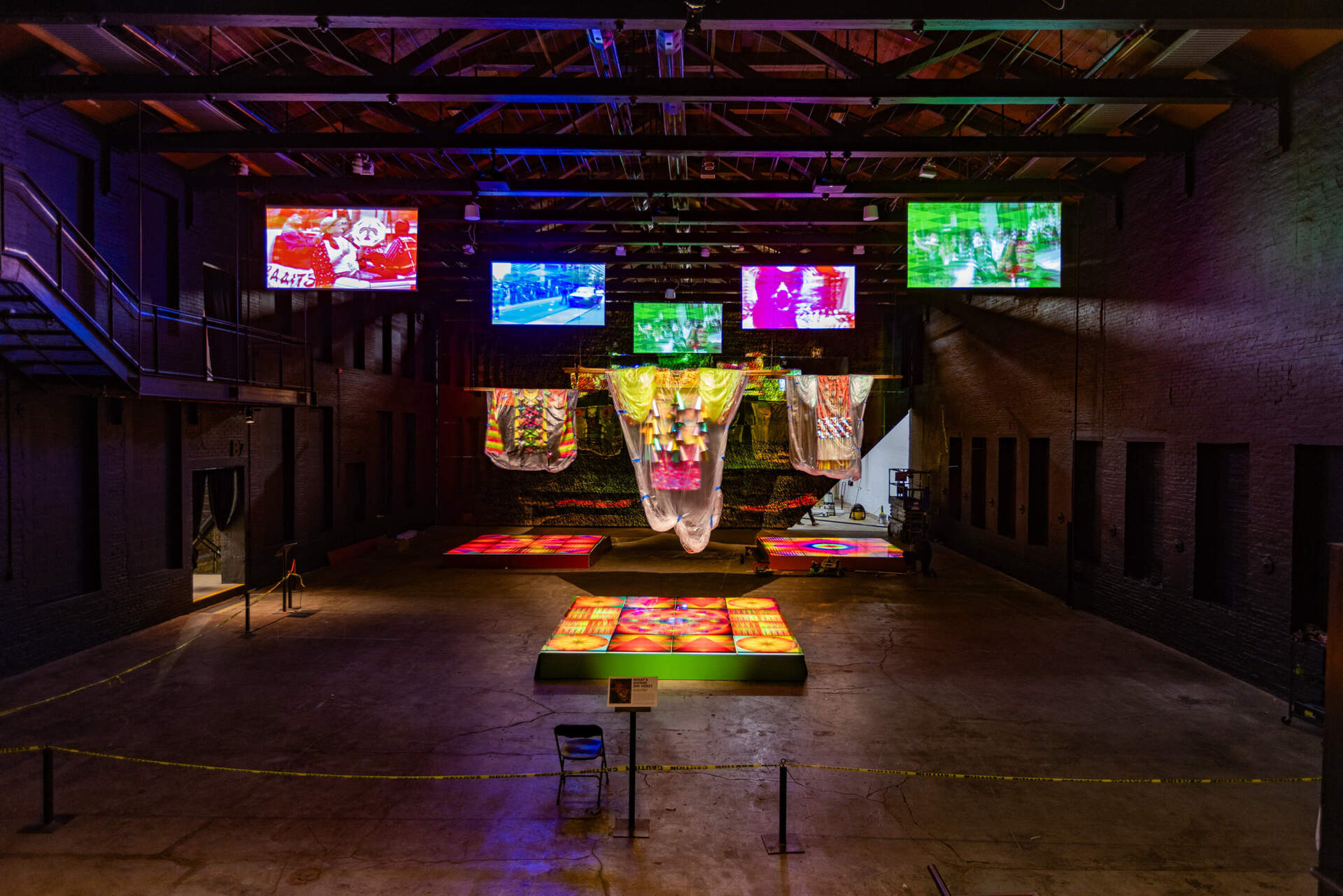 The front gallery, "Your Spirit Whispers in My Ear," of Jeffrey Gibson's exhibit "Power Full Because We're Different" in the largest space at MASS MoCA. (Jesse Costa/WBUR)