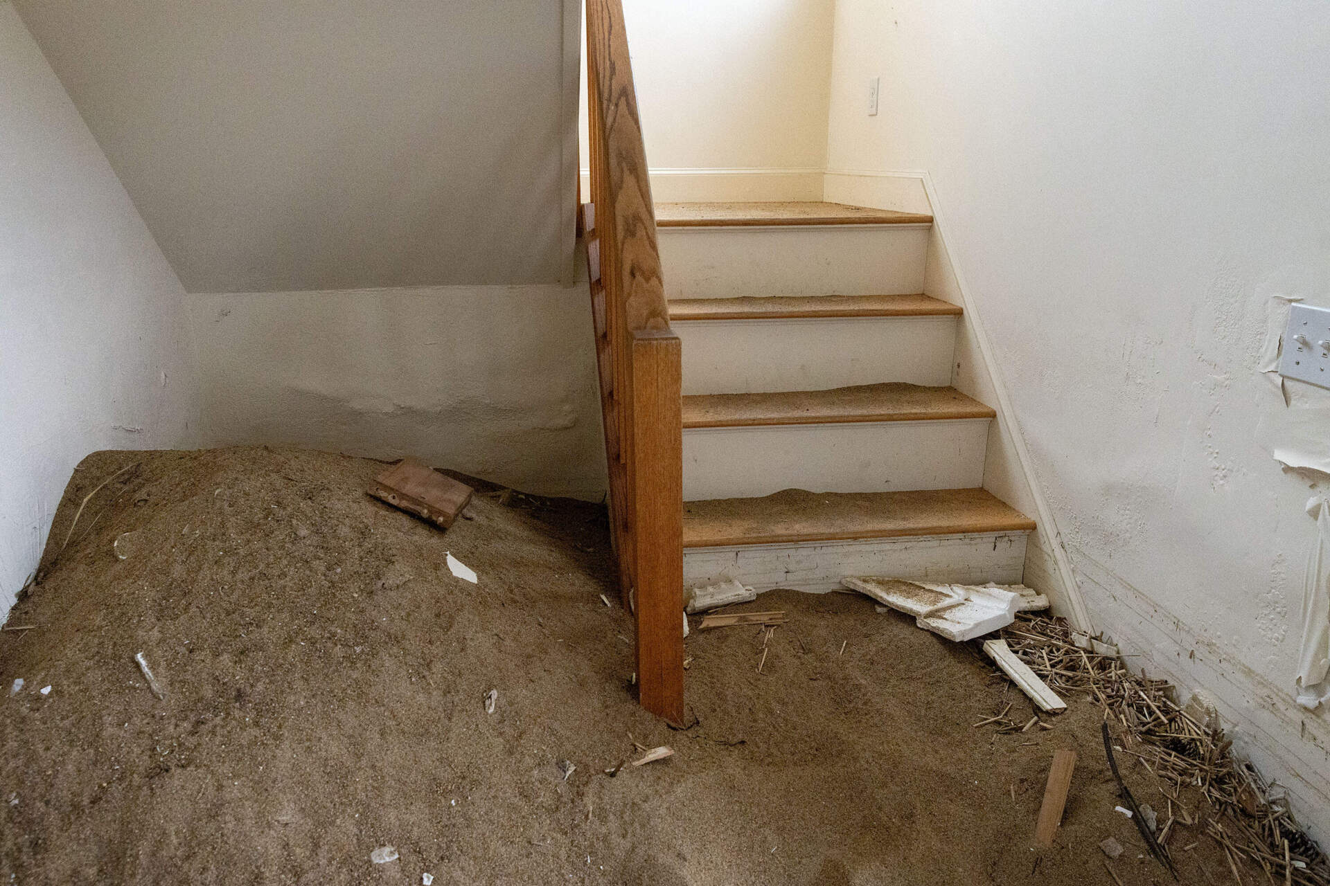 The stairwell of Stanton Sacks' flood damaged beachfront property on 73rd Street on Plum Island. (Robin Lubbock/WBUR)