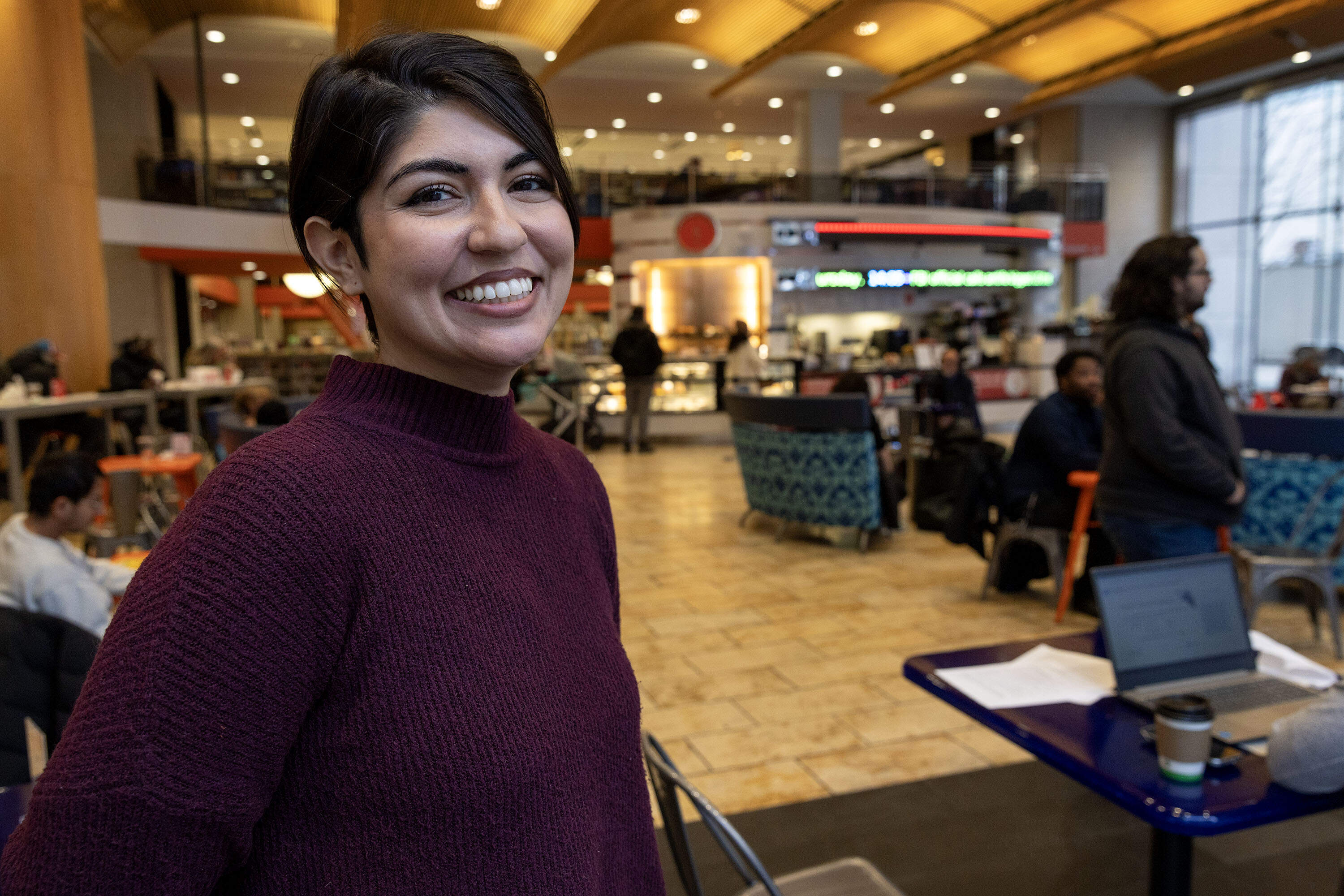 Zarlasht Niaz, author of novel-in-verse "Unfurling," at the Newsfeed Cafe at the Boston Public Library. (Robin Lubbock/WBUR)